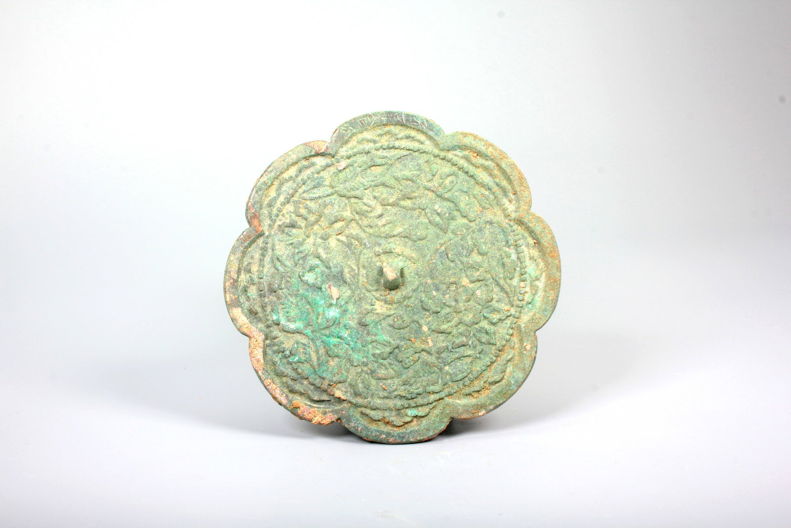 A MING INSCRIBED BRONZE MIRROR: A MING INSCRIBED BRONZE MIRROR W:11CM