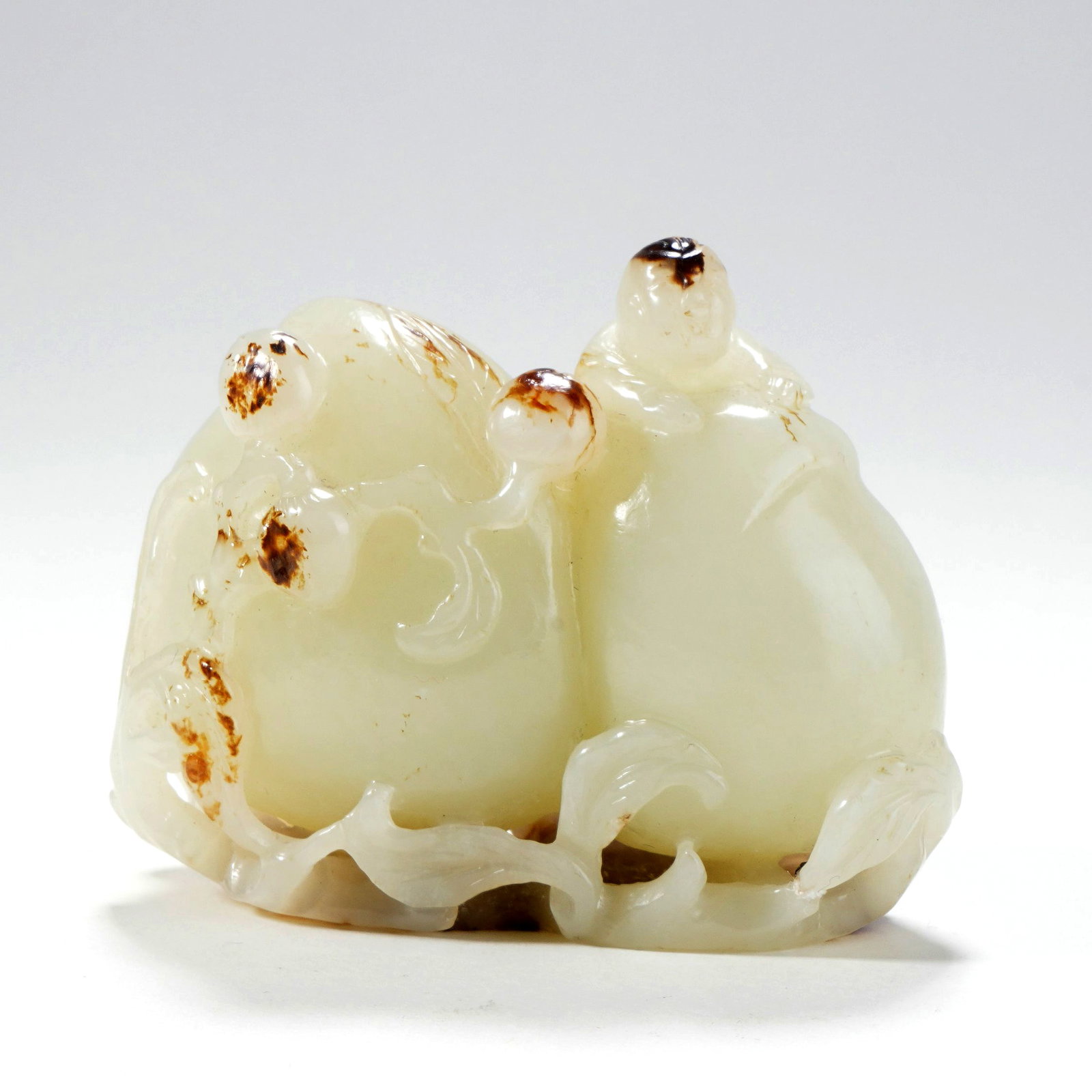 A HETIAN WHITE JADE ORNAMENT OF PRESENTING LONGEVITY (1 of 7)