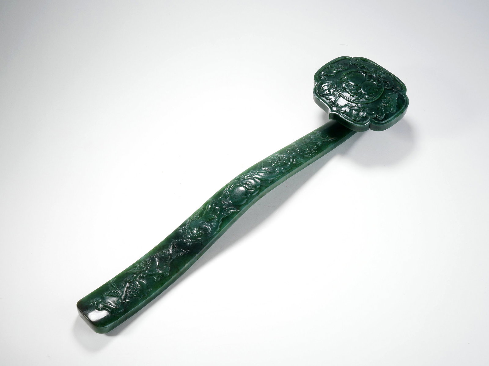 A JASPER CARVED RUYI SCEPTER WITH LONGEVITY PATTERN: A JASPER CARVED RUYI SCEPTER WITH LONGEVITY PATTERN H:5.5CM,L:40CM,W:10.5CM