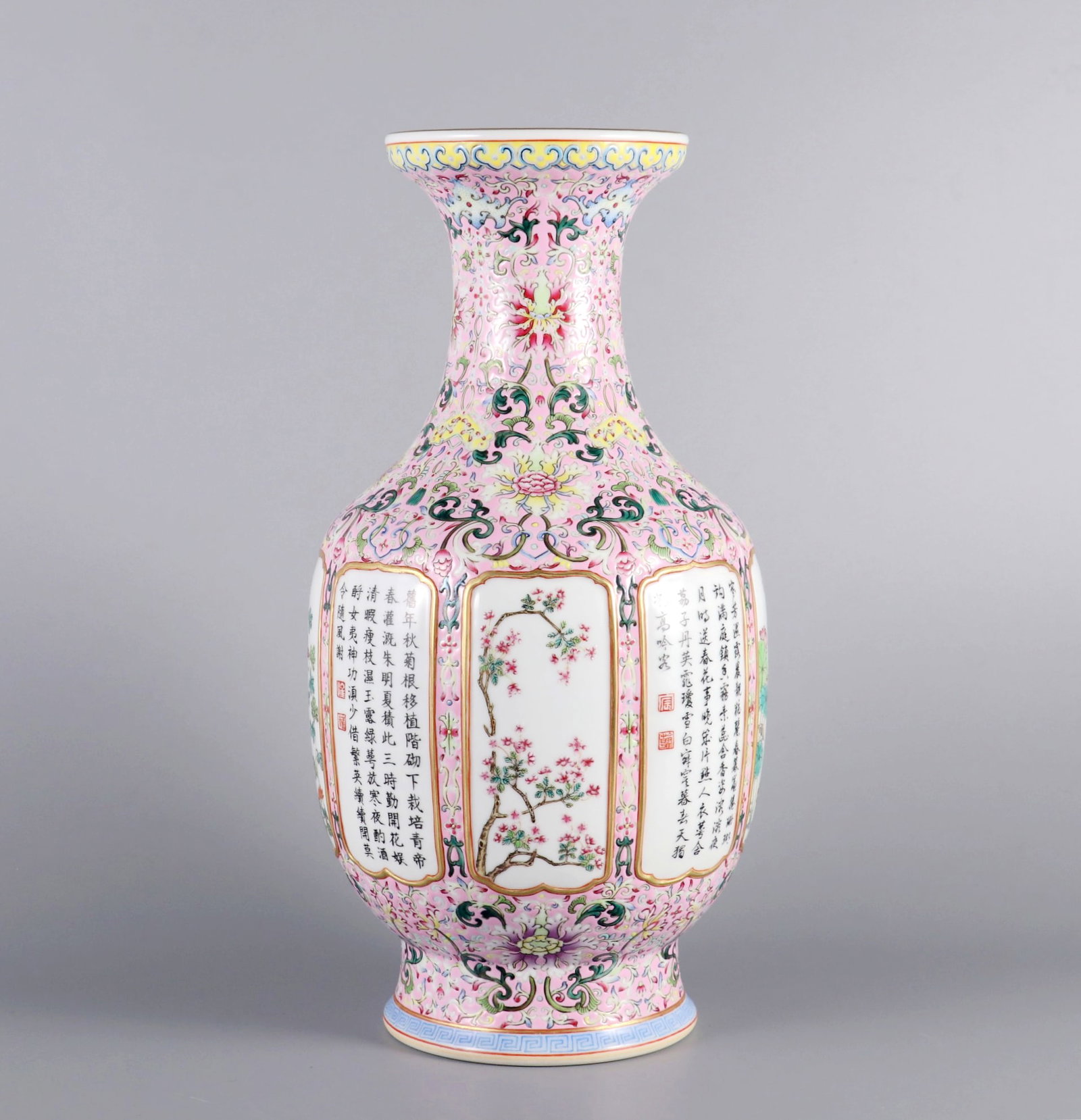 A PINK-GROUND FAMILLE ROSE VASE WITH OPENWORK FOUR-SEASON FLOWERS AND POEMS: A PINK-GROUND FAMILLE ROSE VASE WITH OPENWORK FOUR-SEASON FLOWERS AND POEMS H:33.5CM,D:15.5CM