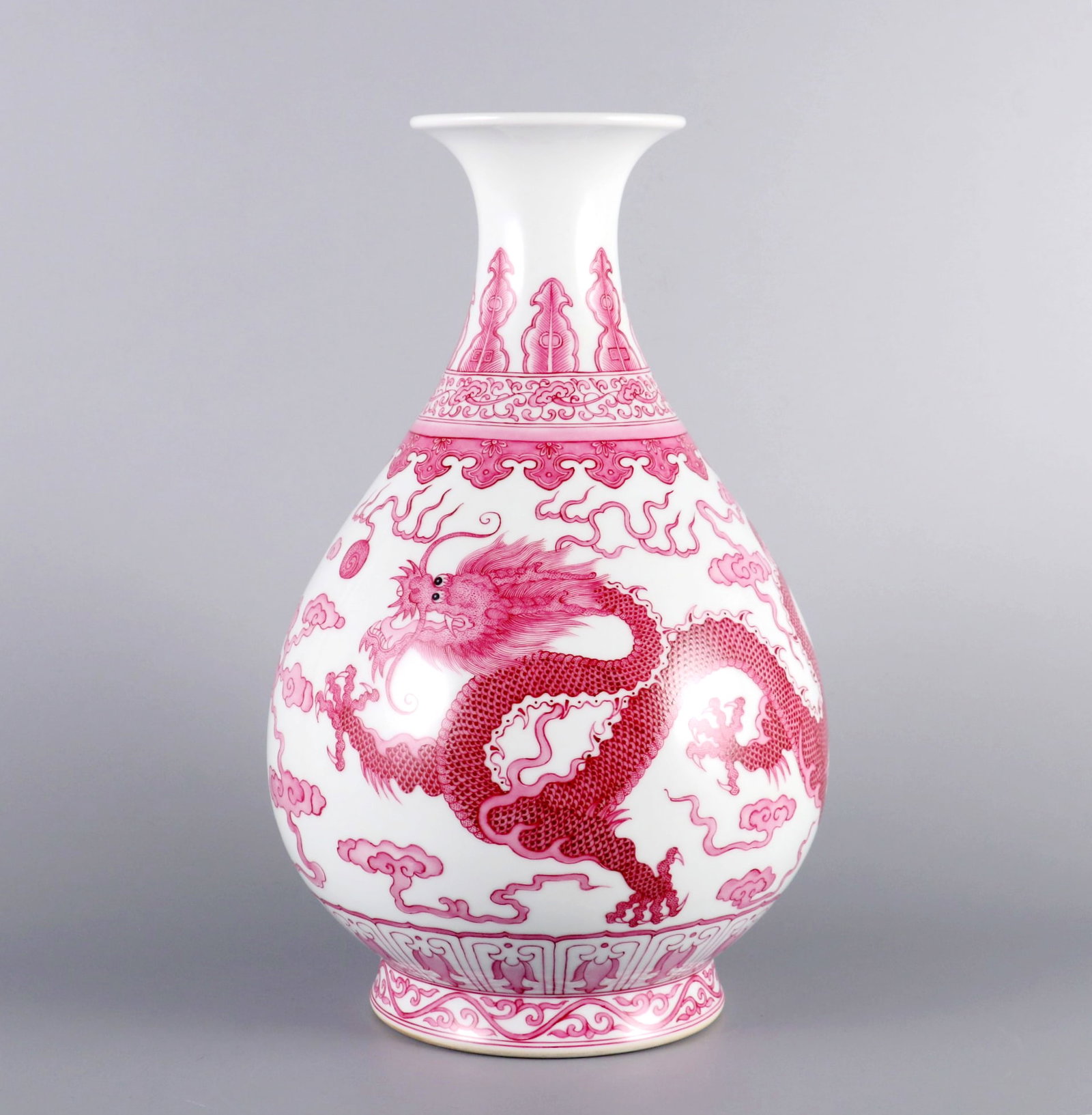 A ROUGE RED COLOR JADE SPRING VASE WITH TWO DRAGONS CHASING PEARL: A ROUGE RED COLOR JADE SPRING VASE WITH TWO DRAGONS CHASING PEARL H:30.6CM,D:17.5CM