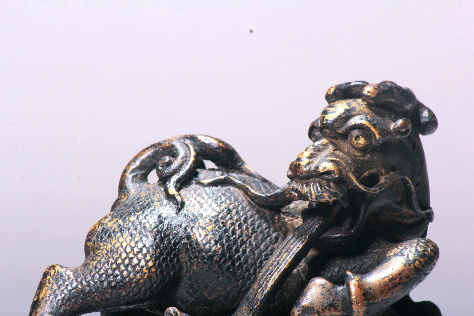 A BRONZE PAPER WEIGHT - 2