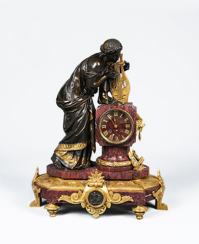 A Western 'Pigeon's Blood' Marble and Gilt-Bronze Figural Striking Clock (1 of 5)