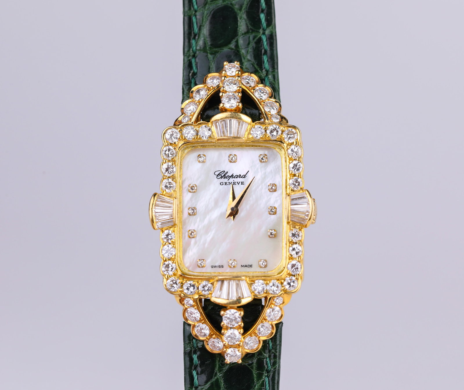 A Chopard 18k Gold Mother-of-Pearl and Diamond-Set Mechanical Wristwatch: A Chopard 18k Gold Mother-of-Pearl and Diamond-Set Mechanical Wristwatch (41 x 22mm)