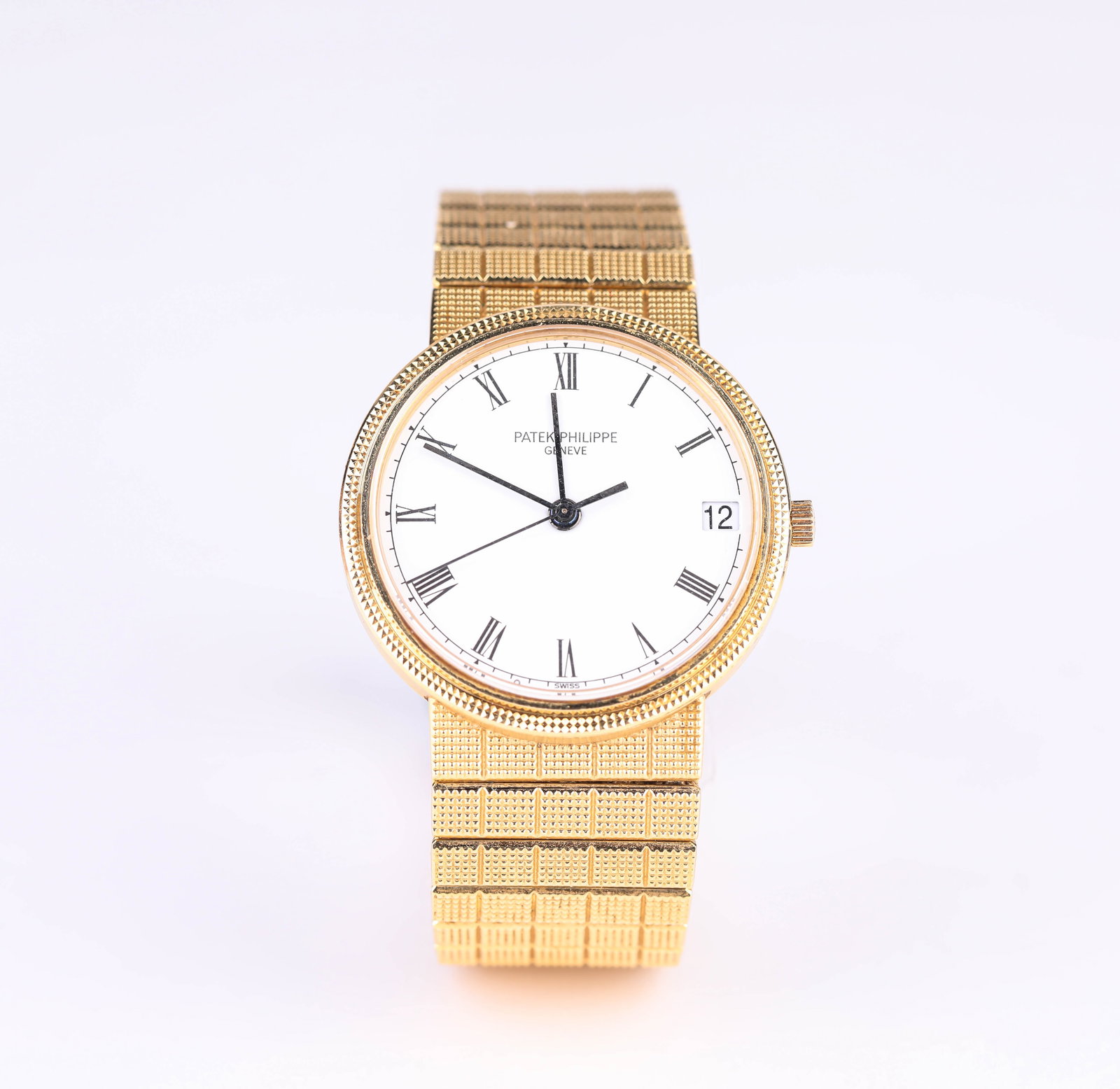 A Patek Philippe 18k Gold Automatic Mechanical Wristwatch (1 of 2)