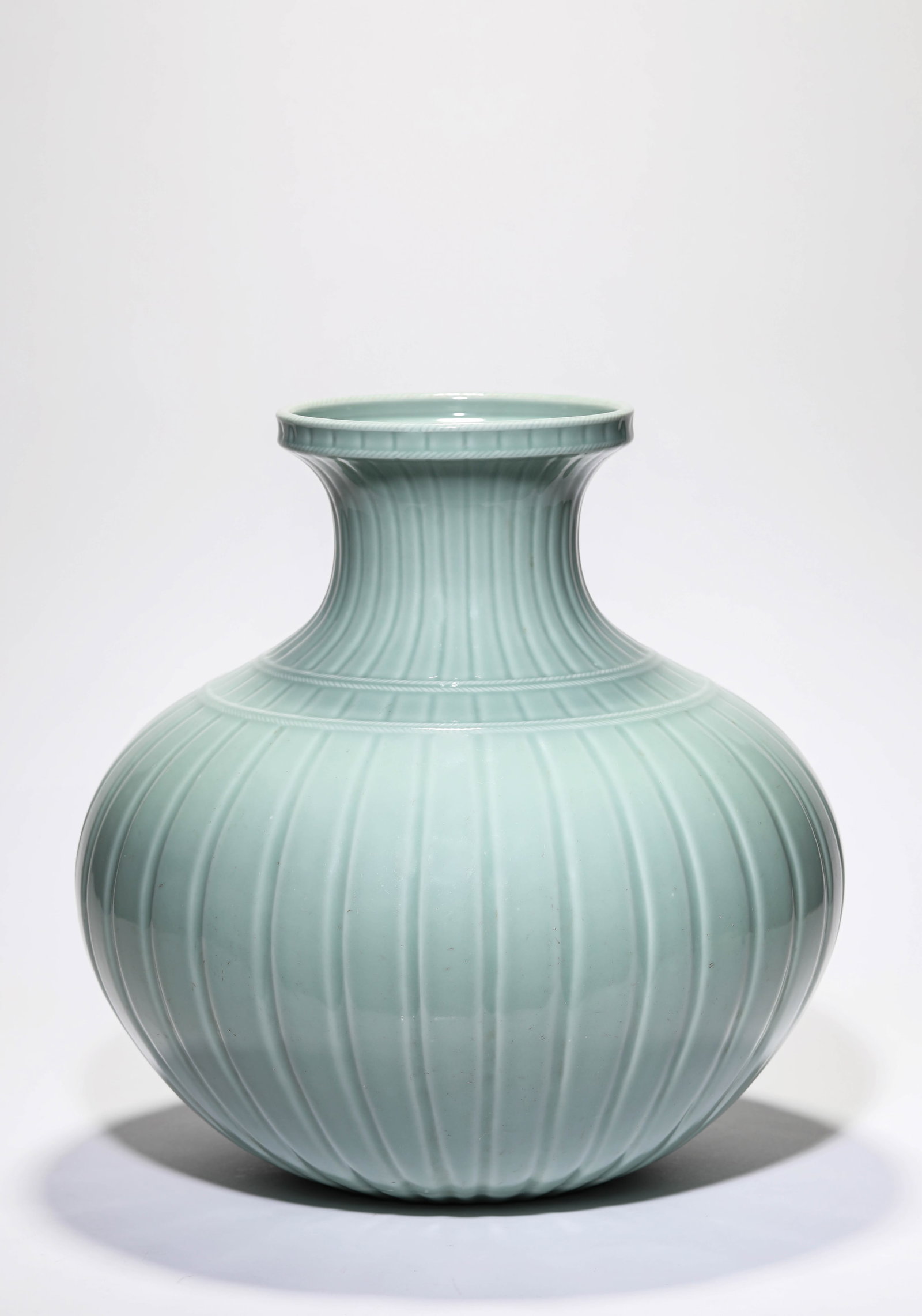 A Powder-Green-Glazed 'Fish Basket' Zun (1 of 4)