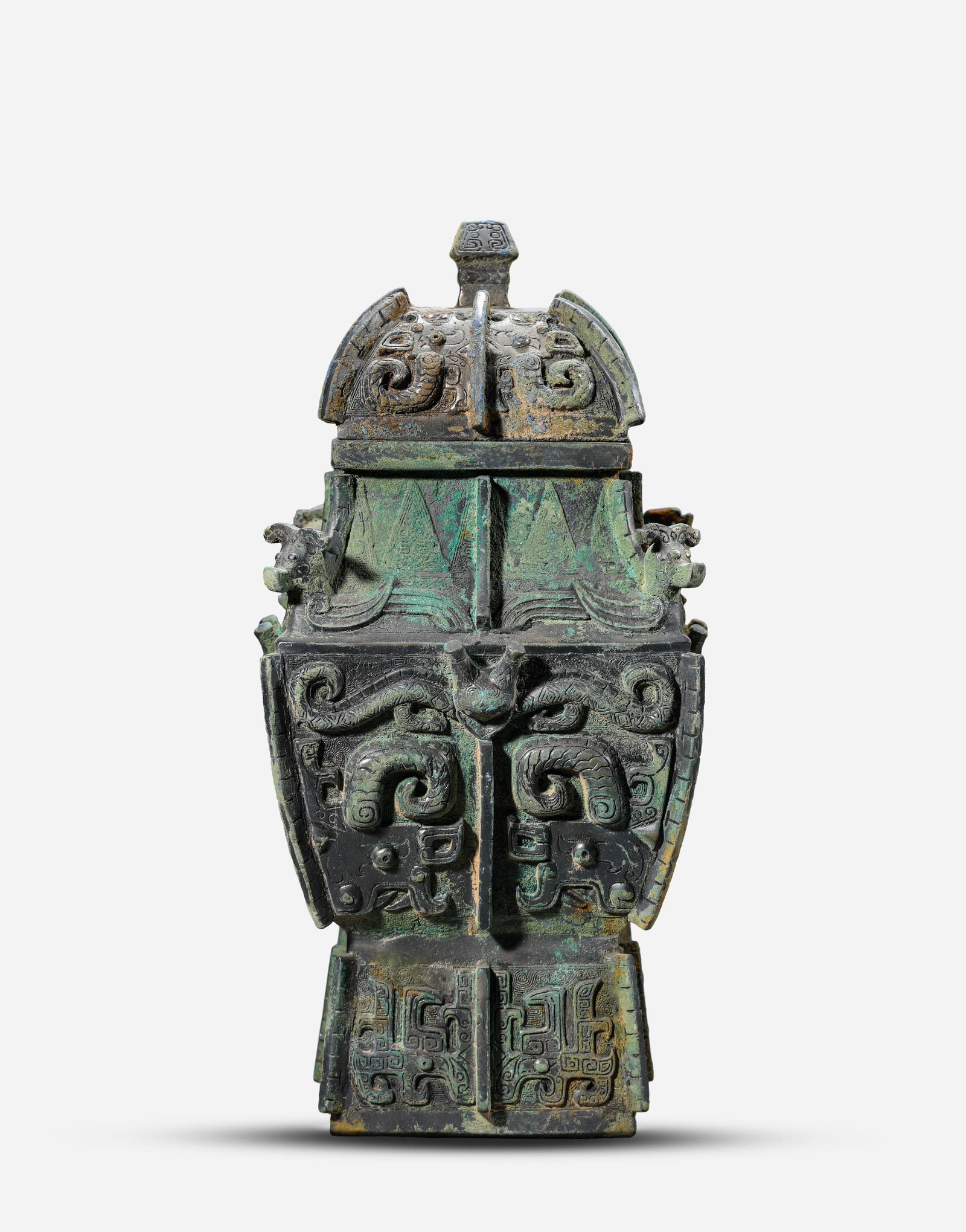 A Bronze 'Taotie' 'Fangyi' Ritual Vessel: A Bronze 'Taotie' 'Fangyi' Ritual Vessel (16.7 x 15.3 x 34.5cm,Weight 5.3kg)