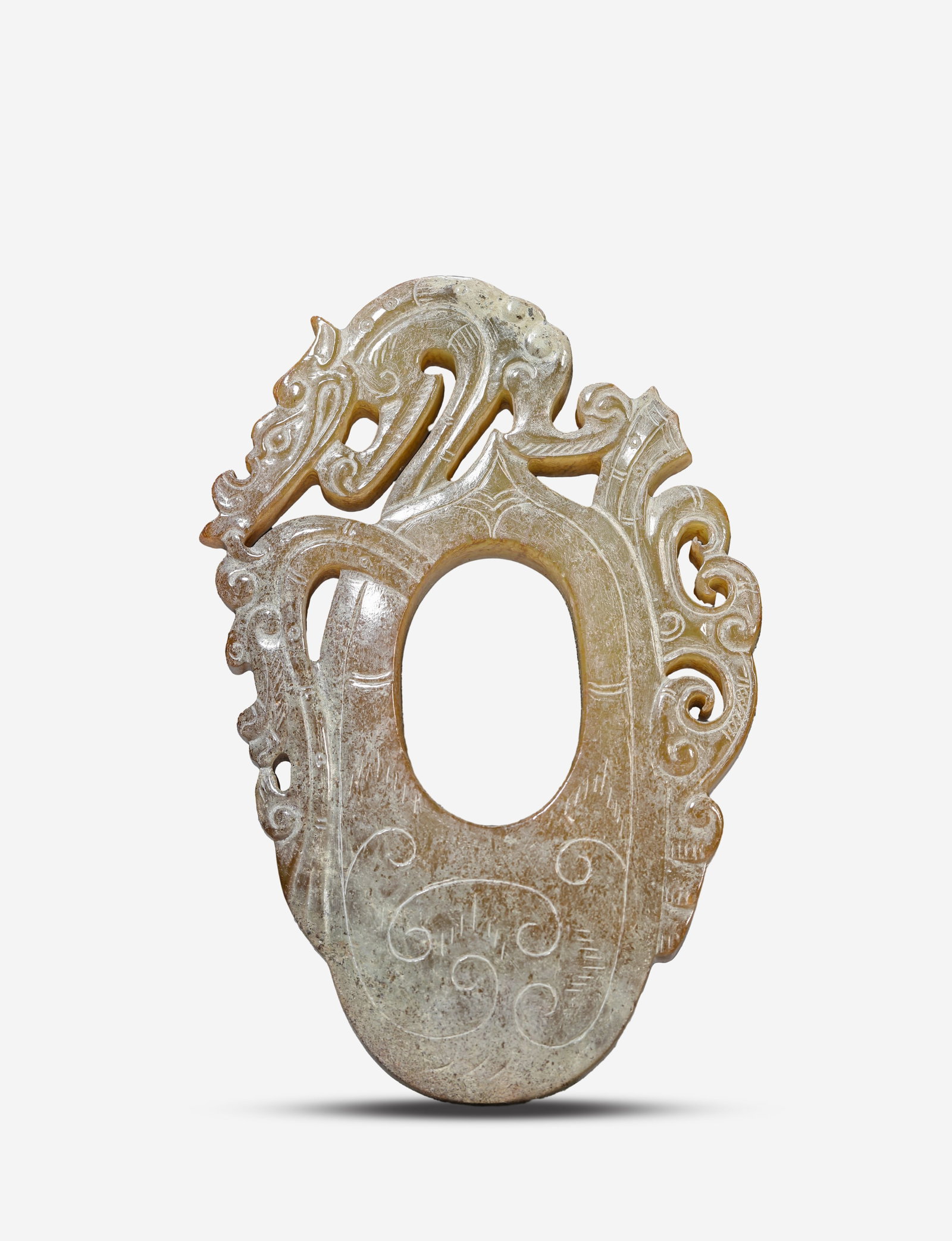 A Jade 'Heart-Shaped' Pendant: A Jade 'Heart-Shaped' Pendant (4.9 x 7.3cm)