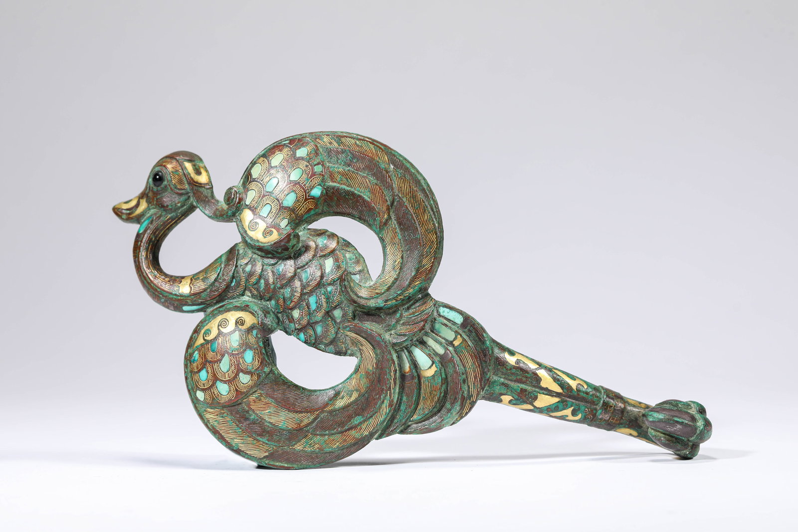 A Gold and Silver-Inlaid Bronze Belt Hook: A Gold and Silver-Inlaid Bronze Belt Hook (20.1 x 10.7cm,Weight 447g)