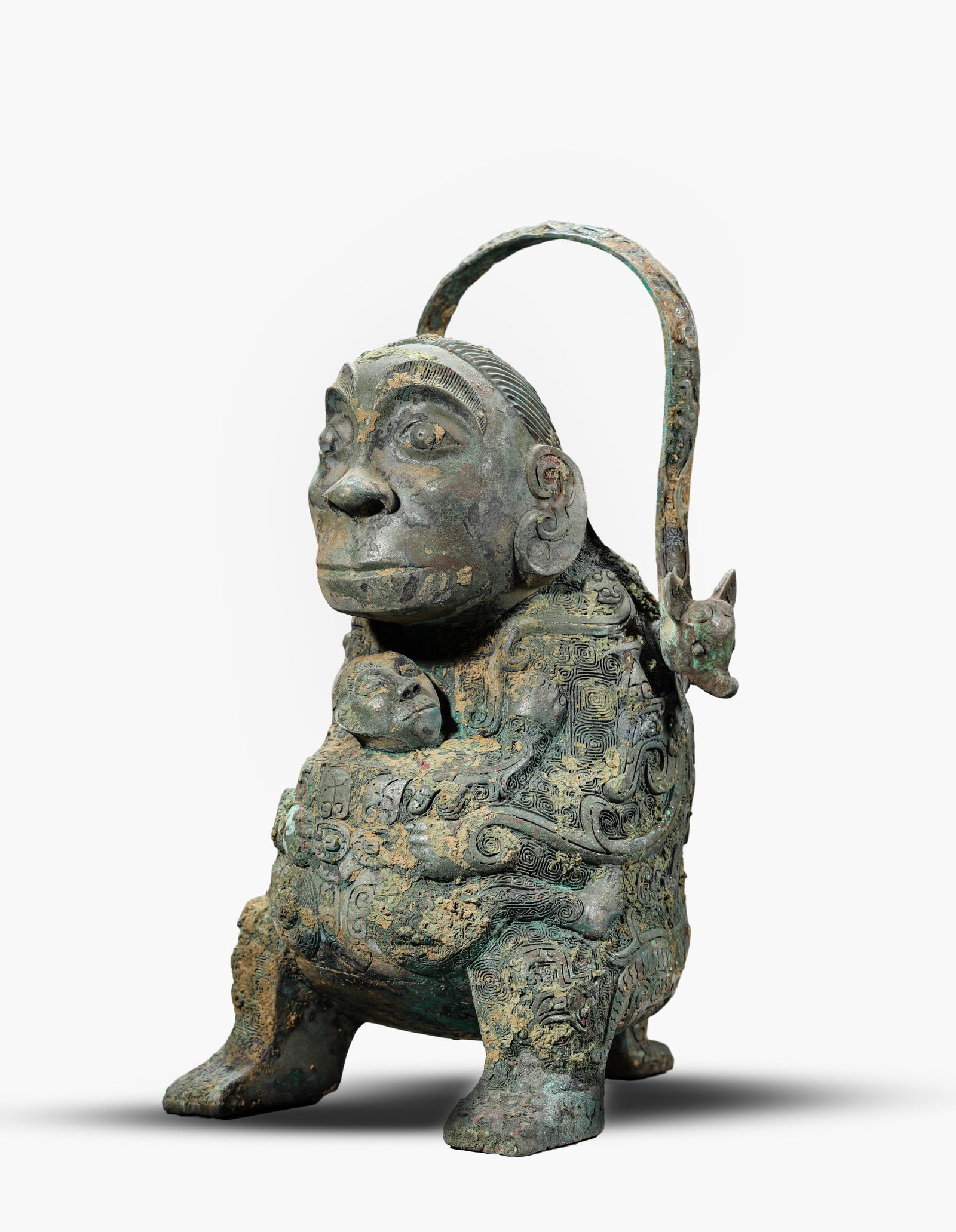 A Bronze 'Human Mask' Loop-Handled You (1 of 4)