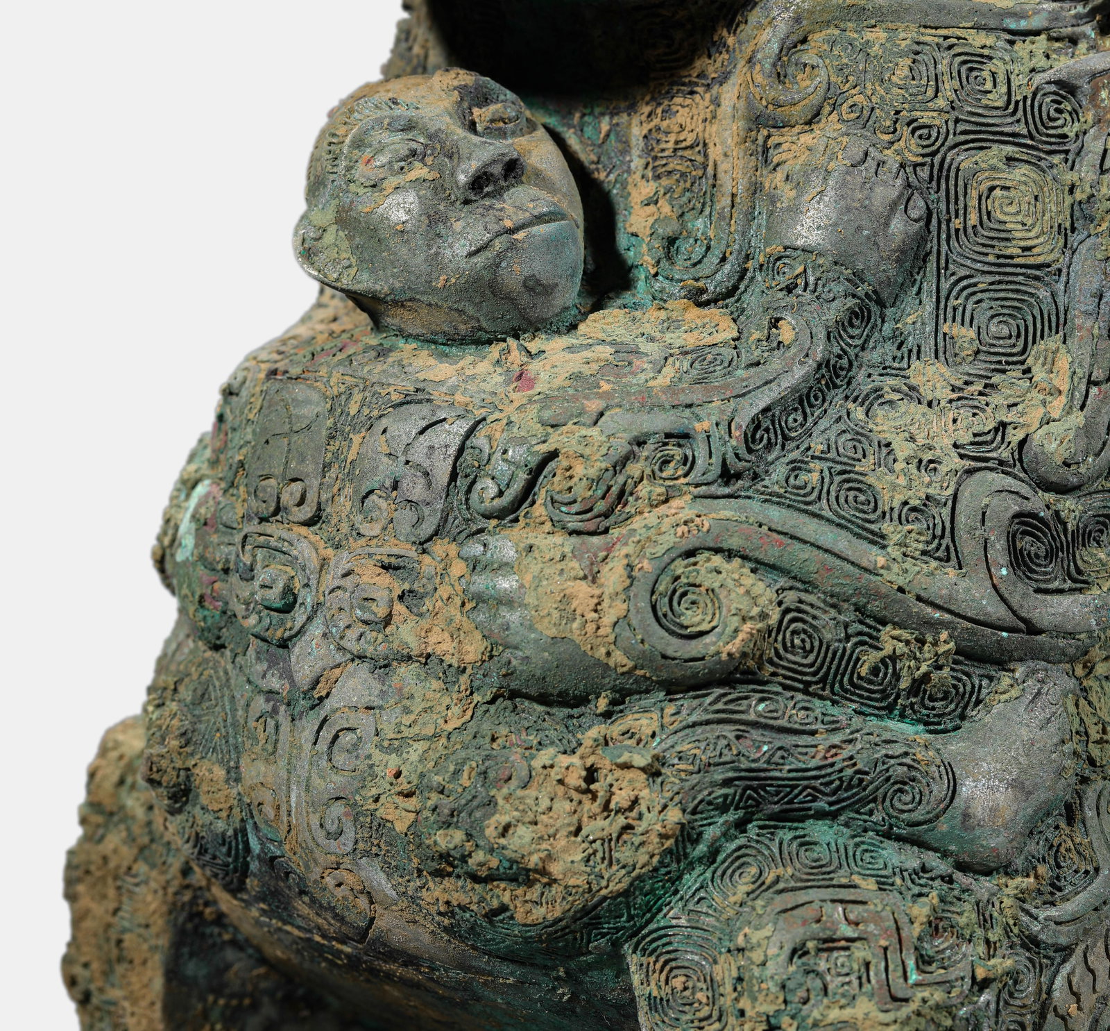 A Bronze 'Human Mask' Loop-Handled You - 2