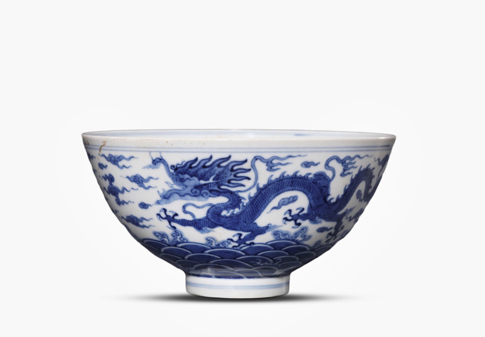 A Blue and White 'Dragon Amidst Waves and Clouds' Bowl: A Blue and White 'Dragon Amidst Waves and Clouds' Bowl (19.5 x 10cm)