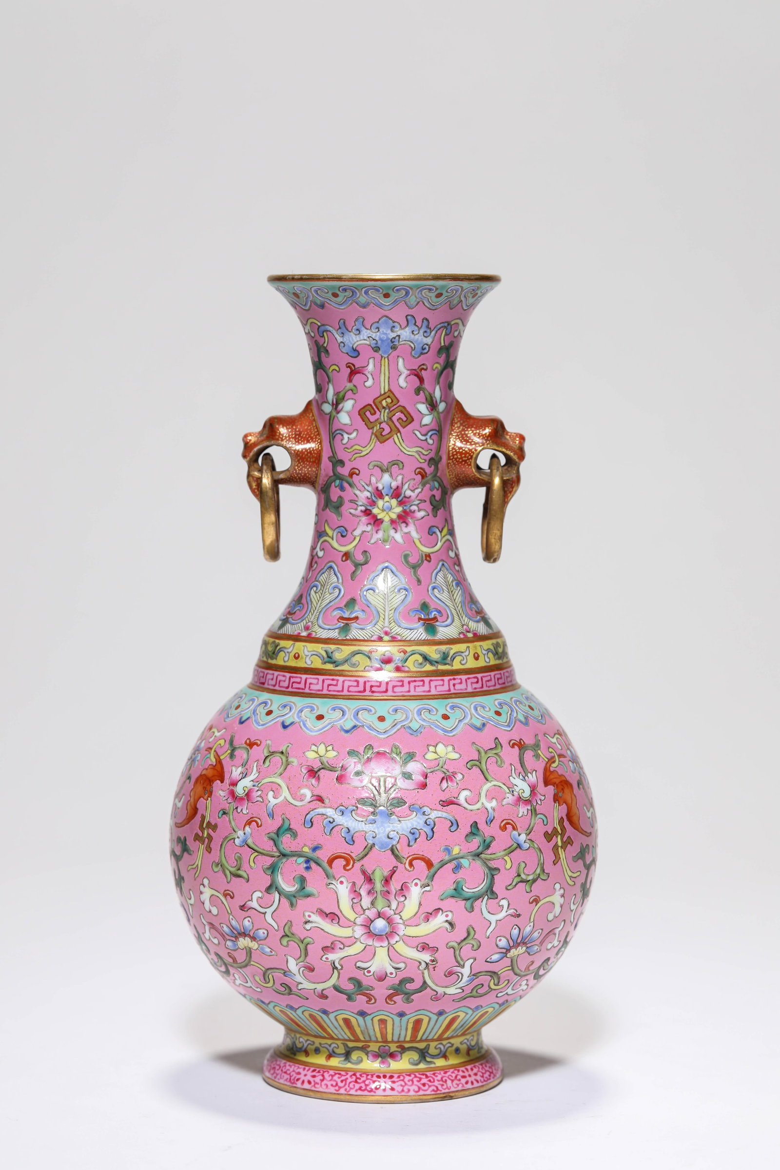 A Red-Ground Yangcai Gilt-Decorated 'Interlocking Lotus and Swastika' Vase: A Red-Ground Yangcai Gilt-Decorated 'Interlocking Lotus and Swastika' Vase (10.8 x 20.3cm)