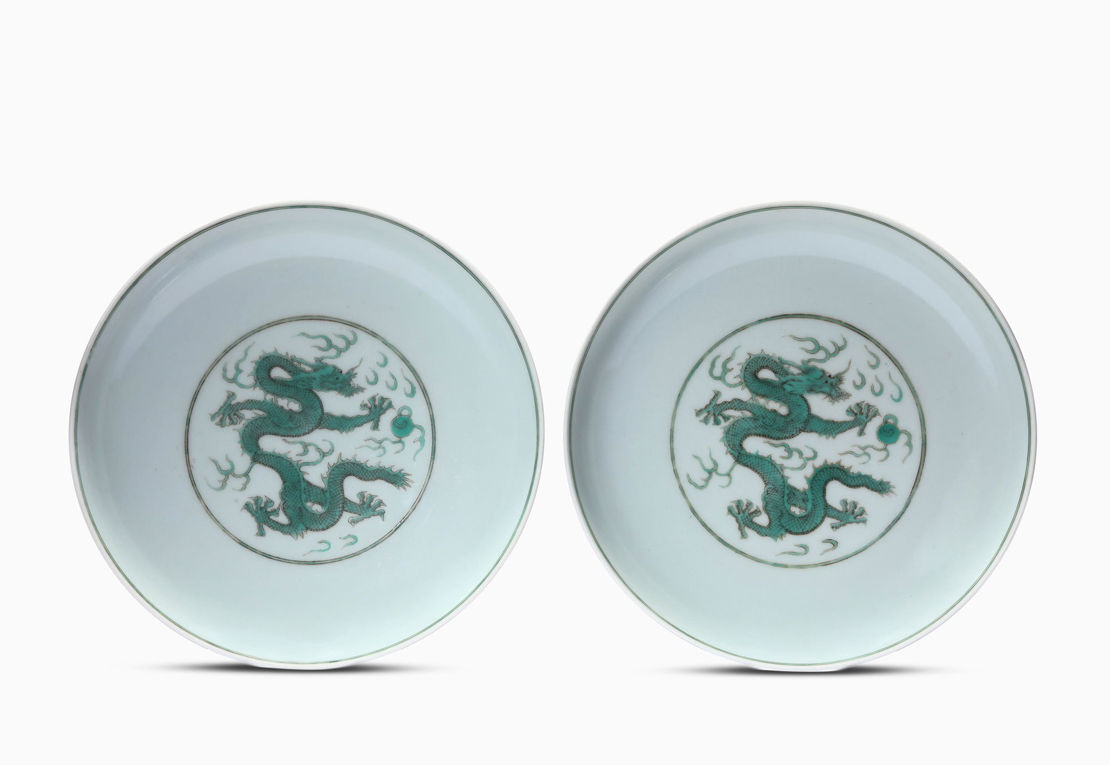 A Pair of Green-Glazed 'Dragon and Clouds' Dishes: A Pair of Green-Glazed 'Dragon and Clouds' Dishes (17.3 x 3.7cm)