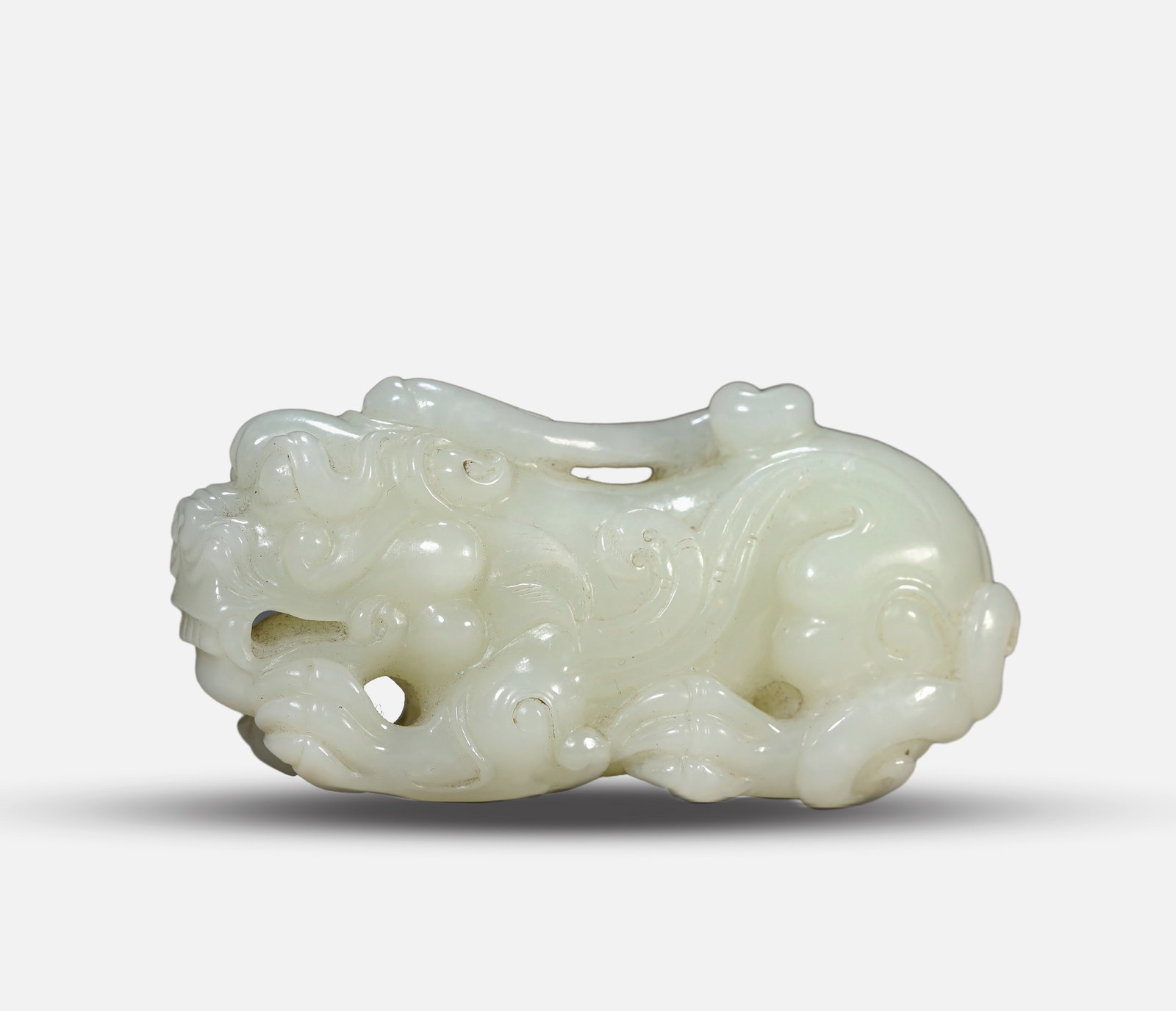 A Jade 'Auspicious Beast': A Jade 'Auspicious Beast' (7.4 x 2.8 x 3.6cm)