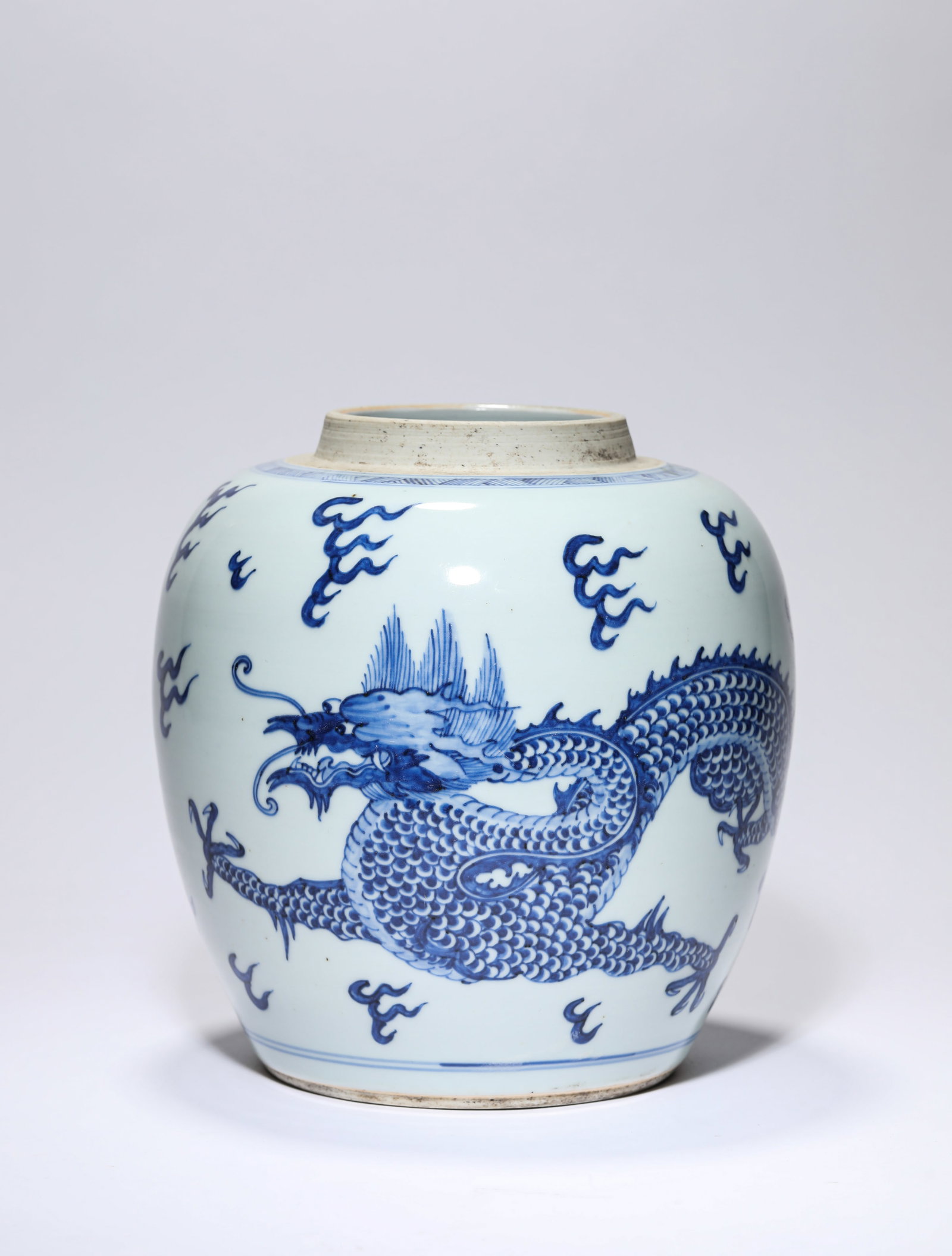 A Blue and White 'Dragon and Clouds' Jar: A Blue and White 'Dragon and Clouds' Jar (19.7 x 21cm)