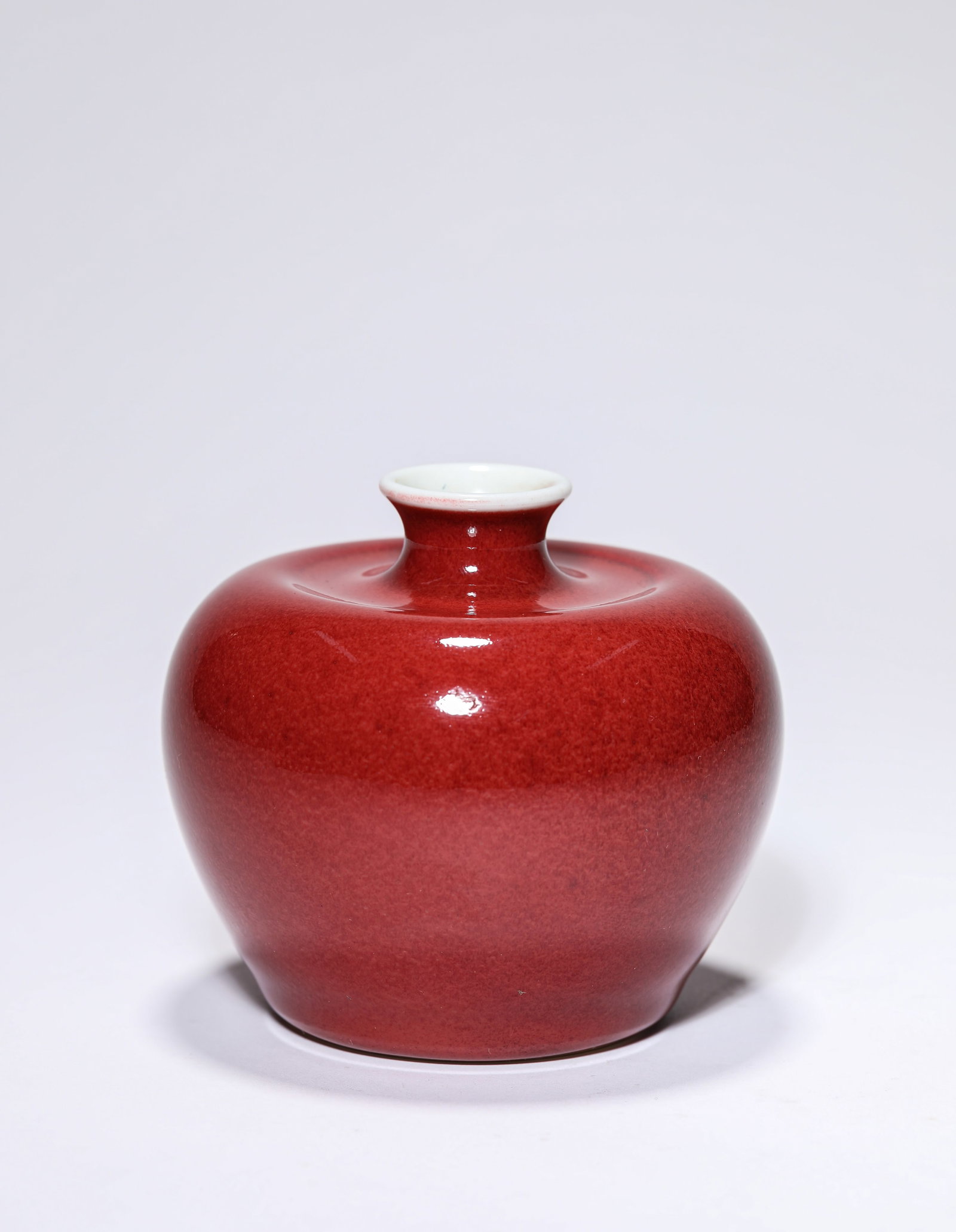 A Langyao Red-Glazed 'Apple-Form' Zun - 2