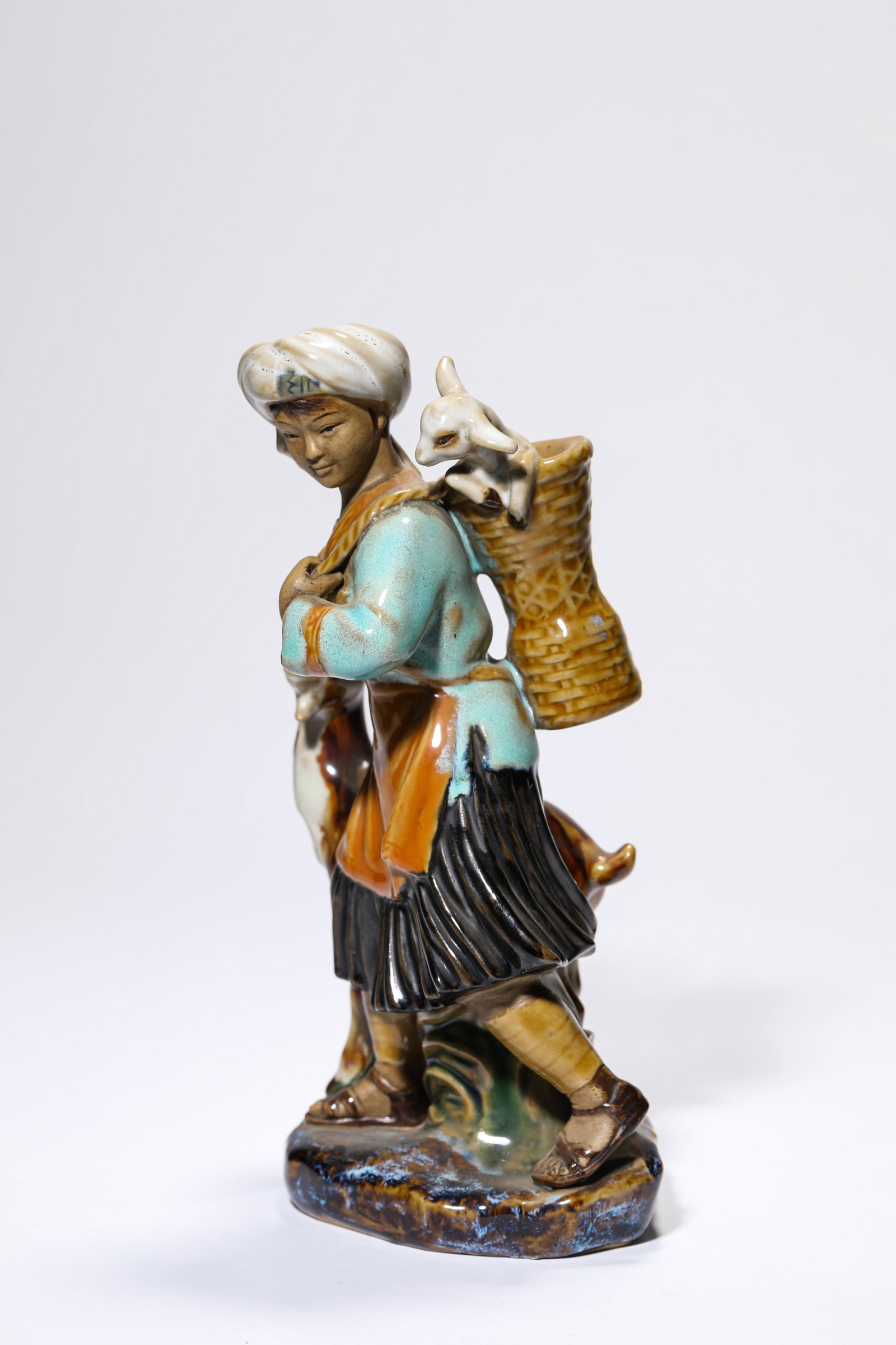 A PORCELAIN FIGURE - 3