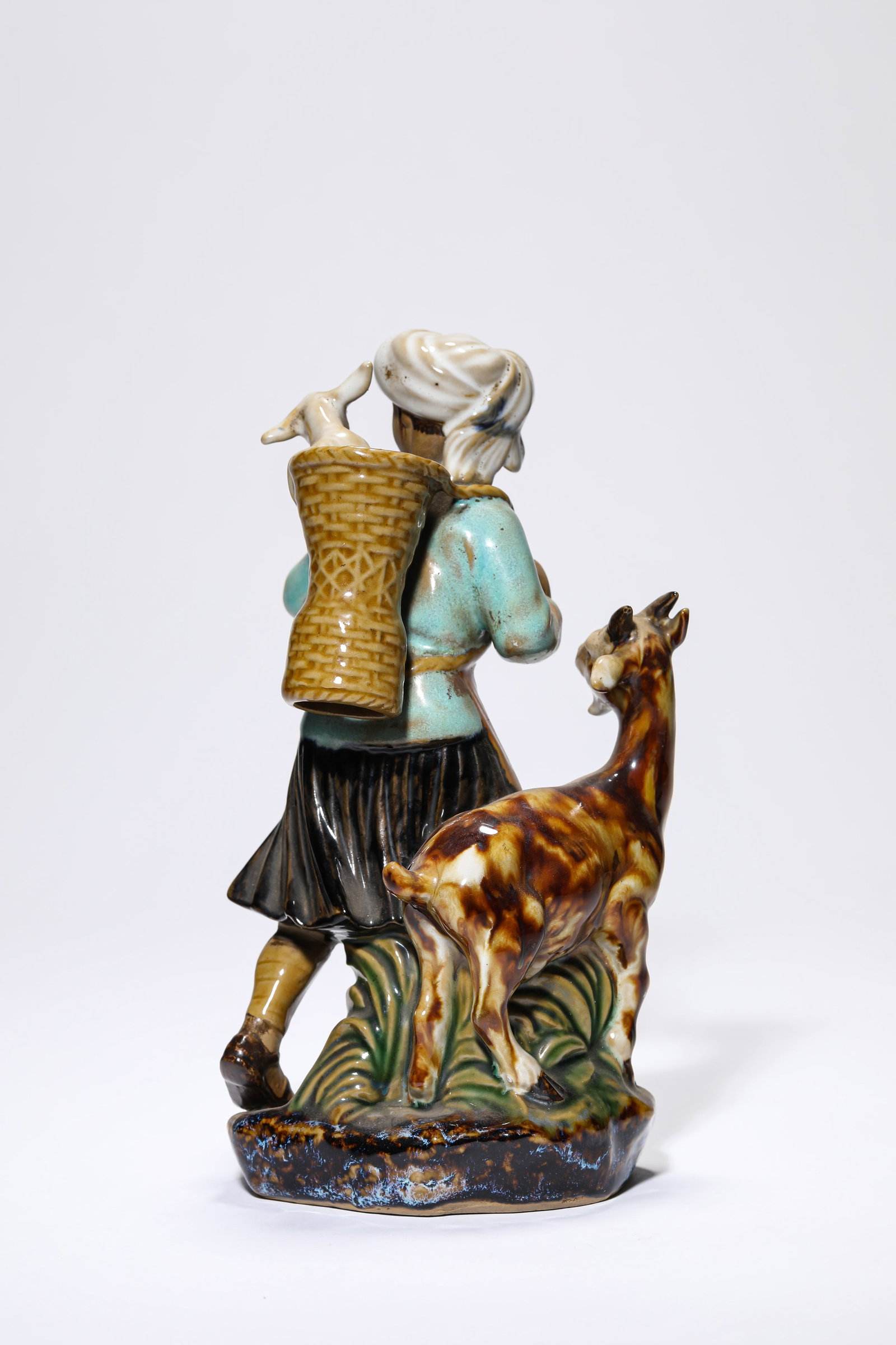 A PORCELAIN FIGURE - 4