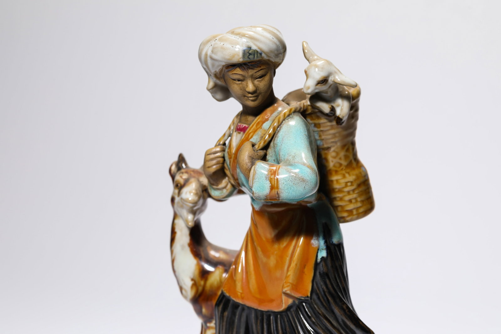 A PORCELAIN FIGURE - 5