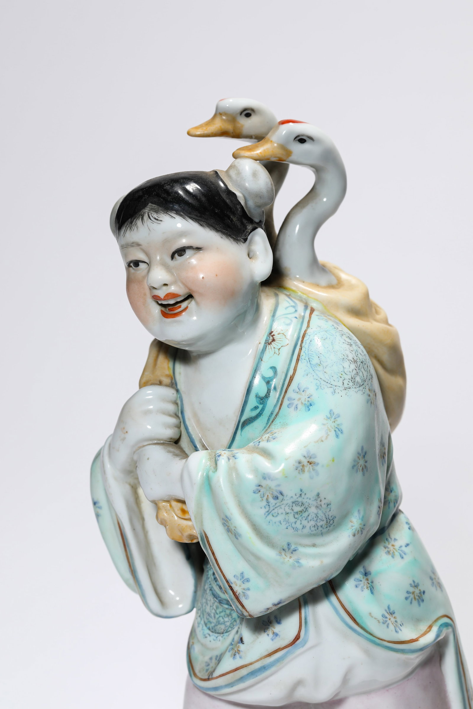 A PORCELAIN FIGURE - 2