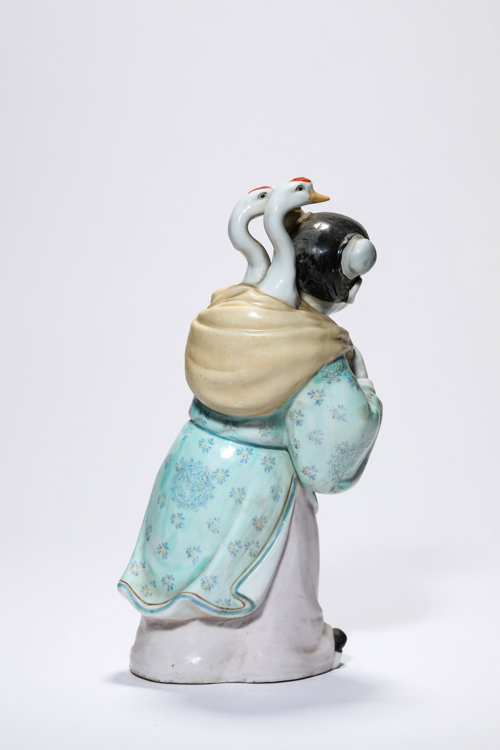 A PORCELAIN FIGURE - 4