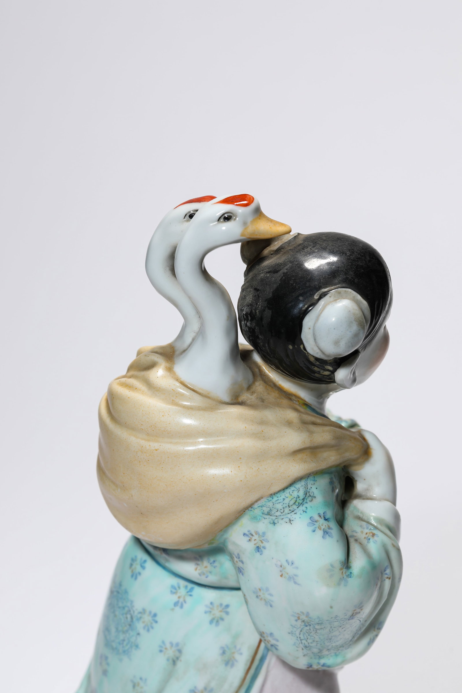A PORCELAIN FIGURE - 5