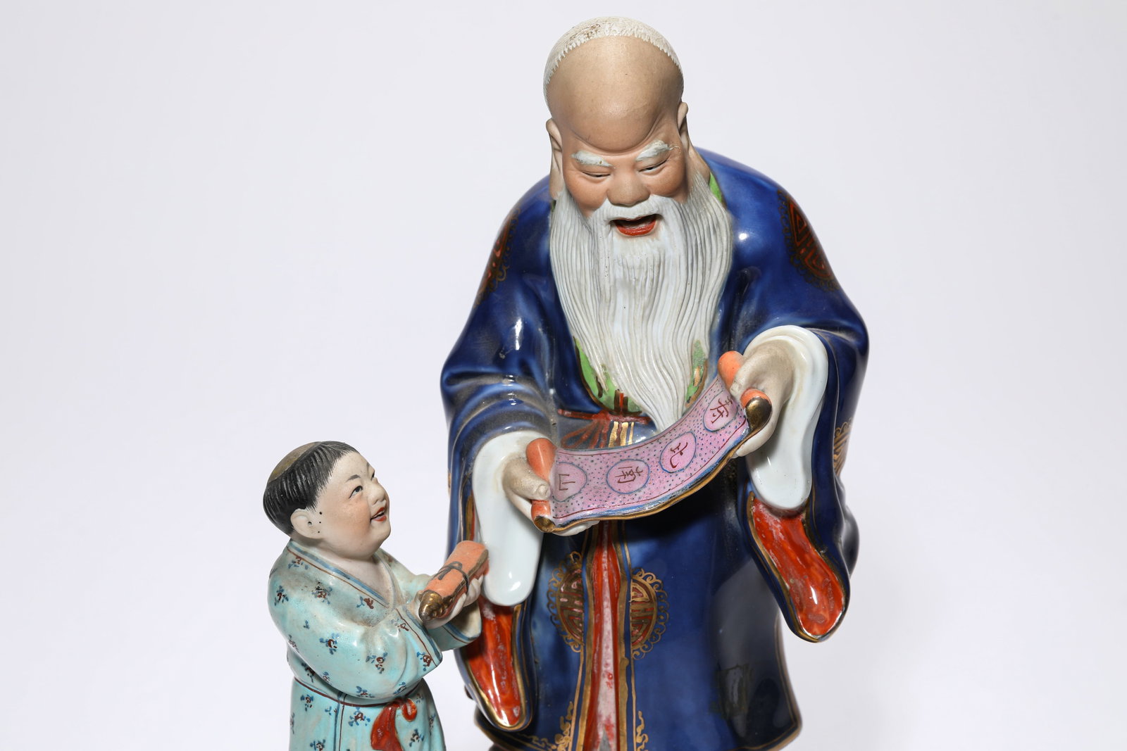 A PORCELAIN FIGURE - 2