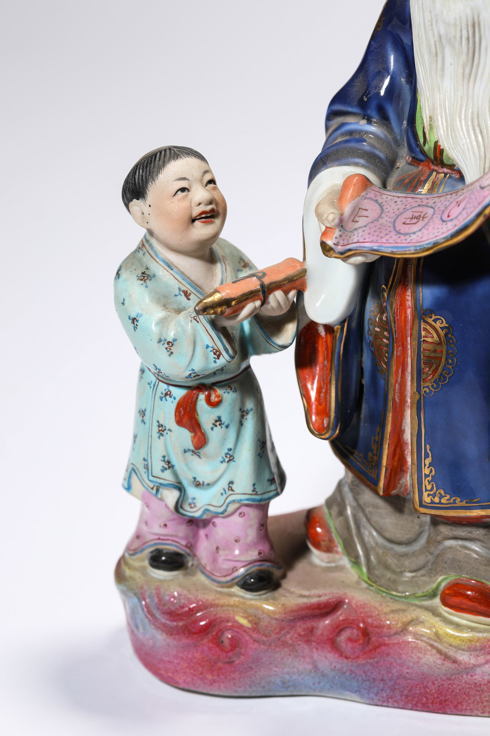 A PORCELAIN FIGURE - 3
