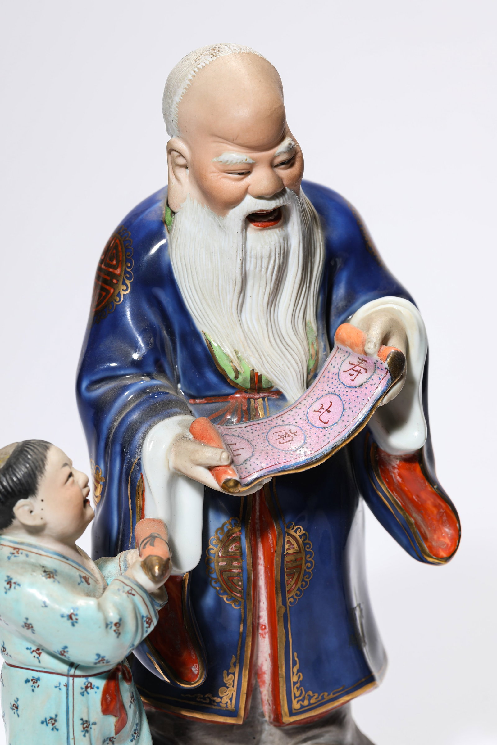 A PORCELAIN FIGURE - 4