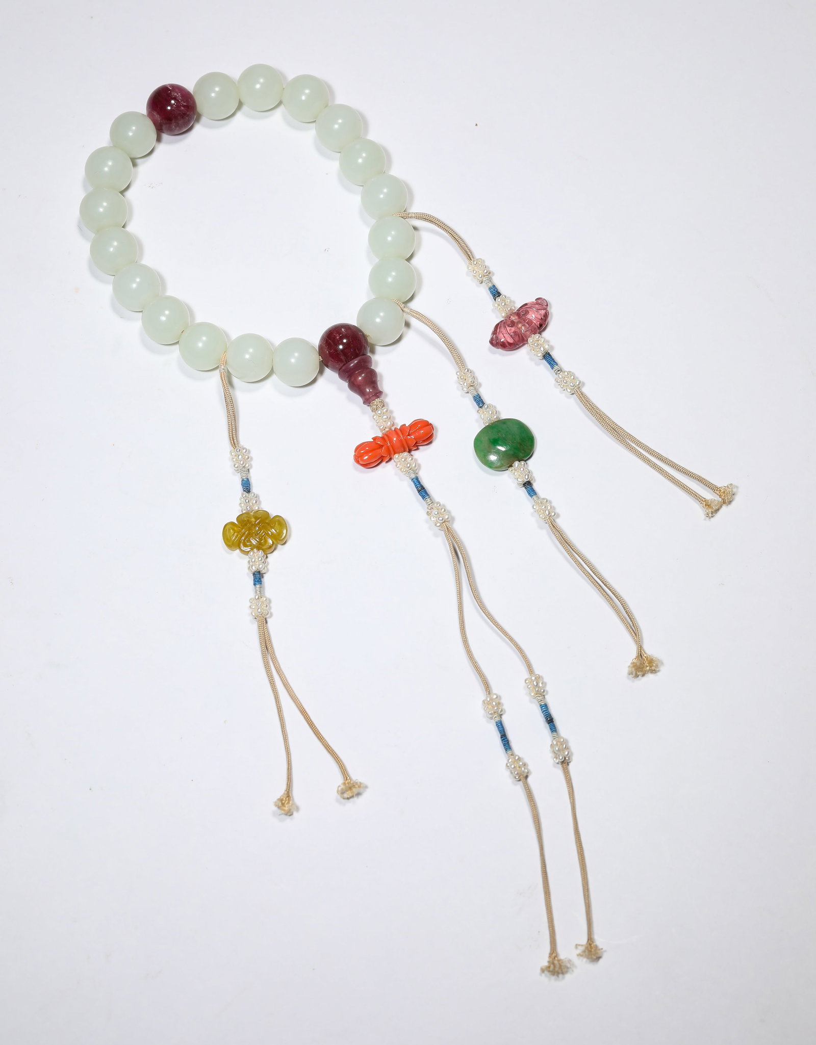 A JADE ‘EIGHTEEN-BEAD’ BRACELET: A JADE ‘EIGHTEEN-BEAD’ BRACELET Description: Dimensions: Width: 1.3 cm. All measurements are approximate.