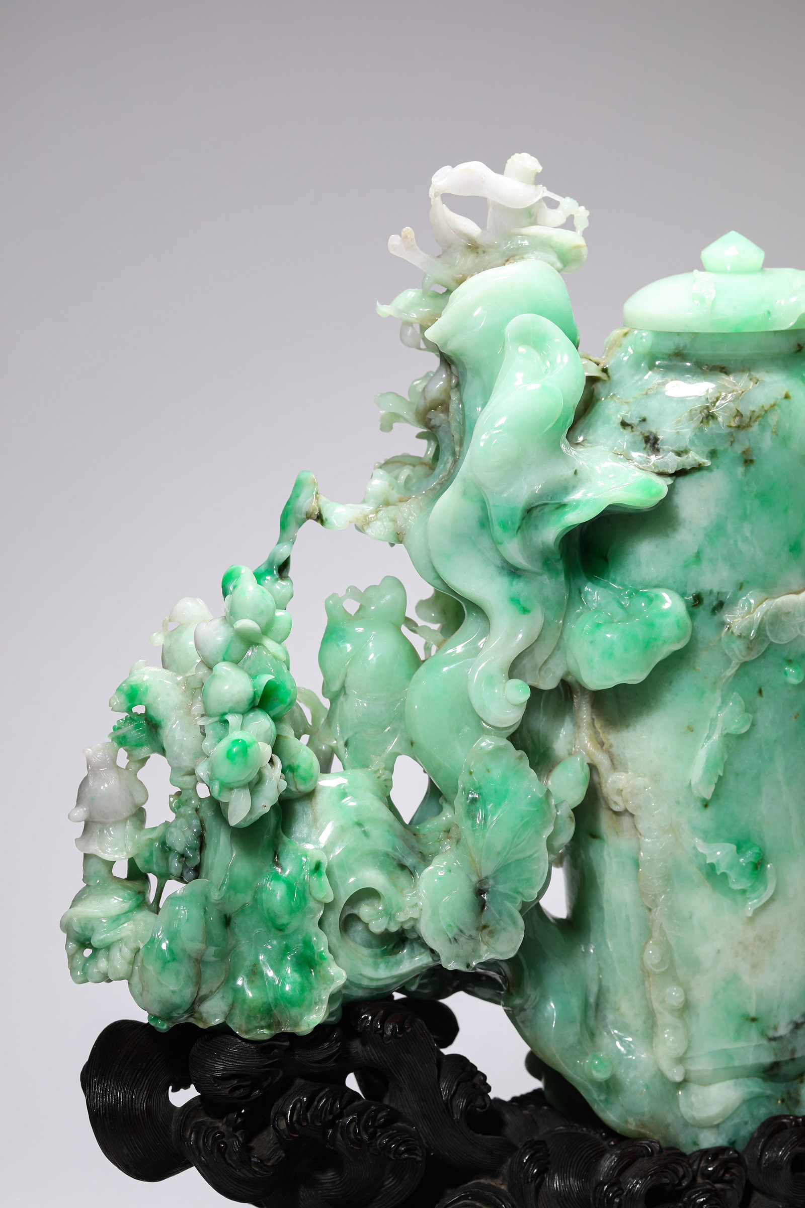 A JADEITE 'EIGHT IMMORTALS' VASE - 8