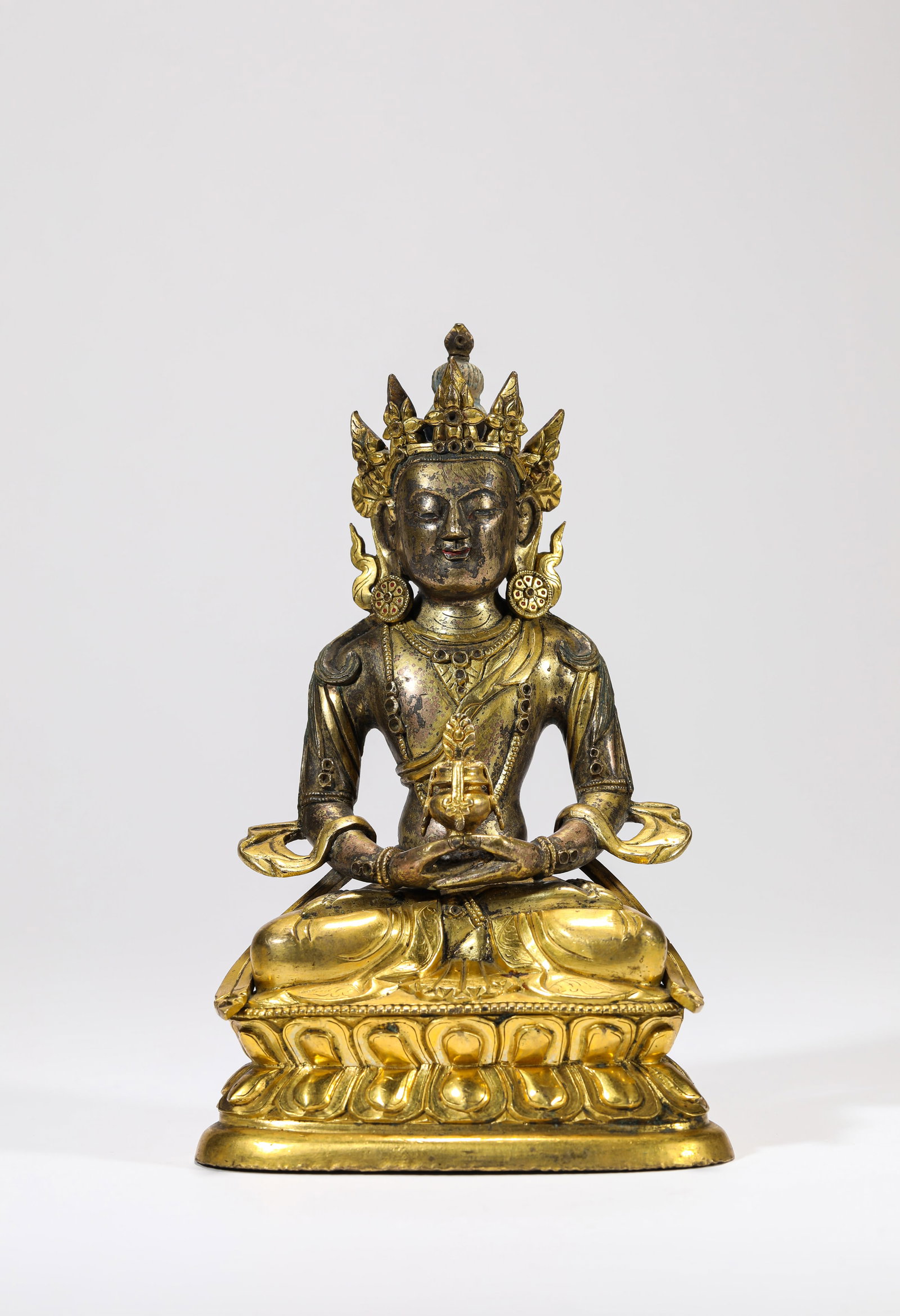 A GILT-BRONZE FIGURE OF AMITAYUS (1 of 6)
