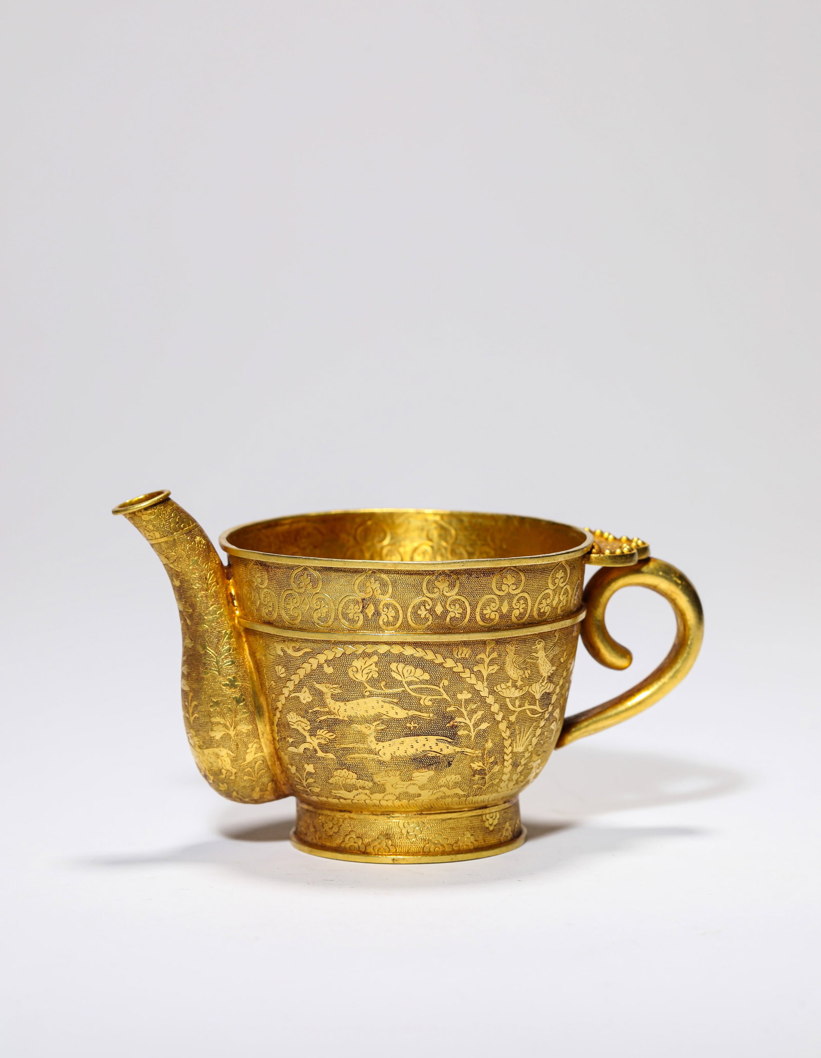 A GOLD 'NARRATIVE SCENE' CUP - 2