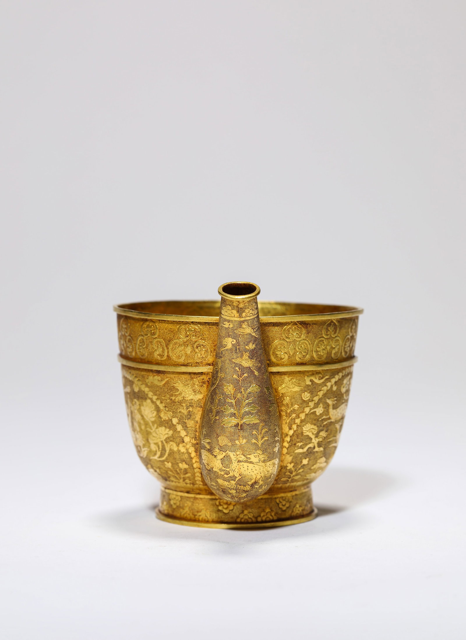 A GOLD 'NARRATIVE SCENE' CUP - 4