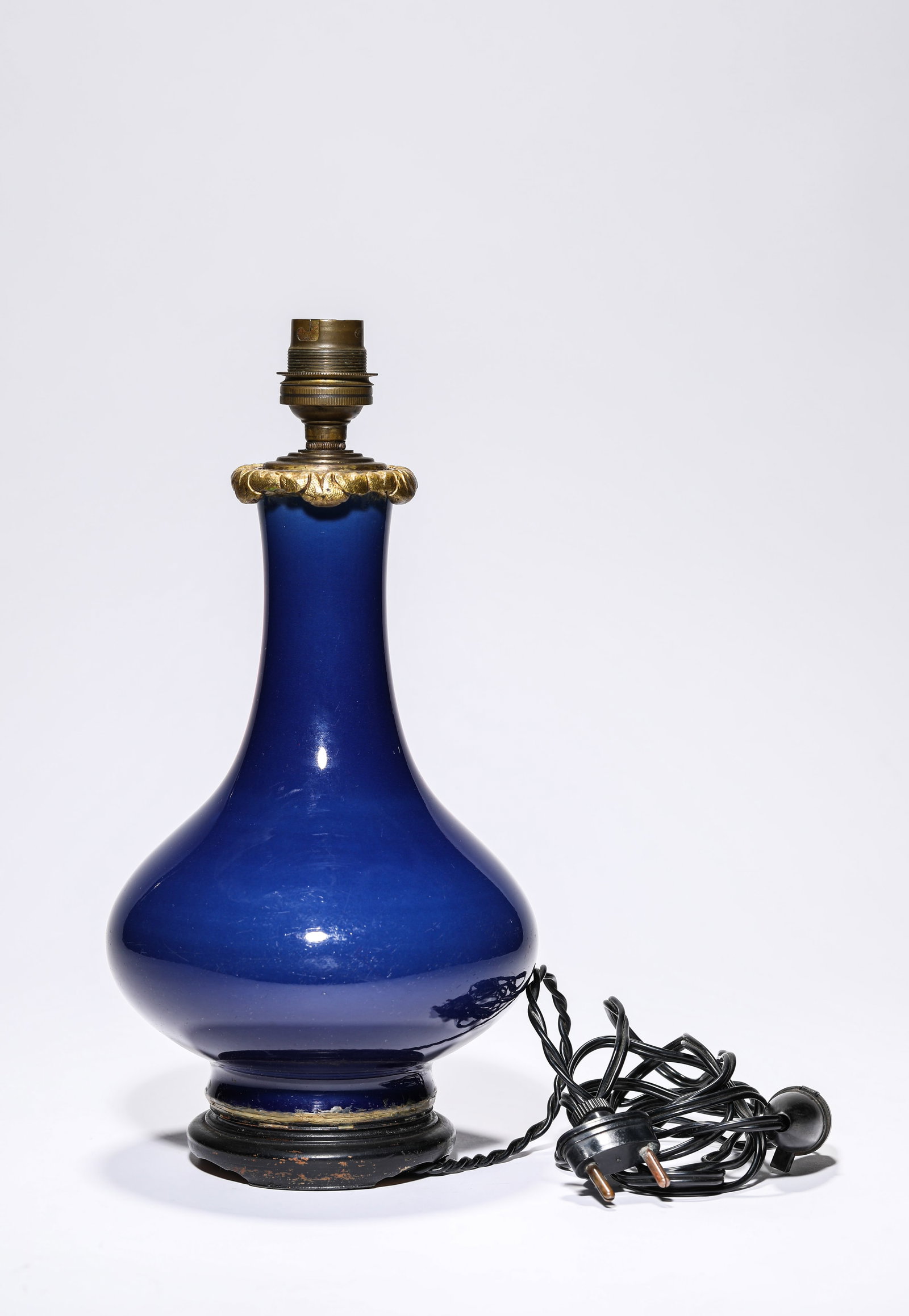 A SAPPHIRE-BLUE-GLAZED VASE: A SAPPHIRE-BLUE-GLAZED VASE Description: Dimensions: Width: 14.1 cm x Height: 27.8 cm. All measurements are approximate.