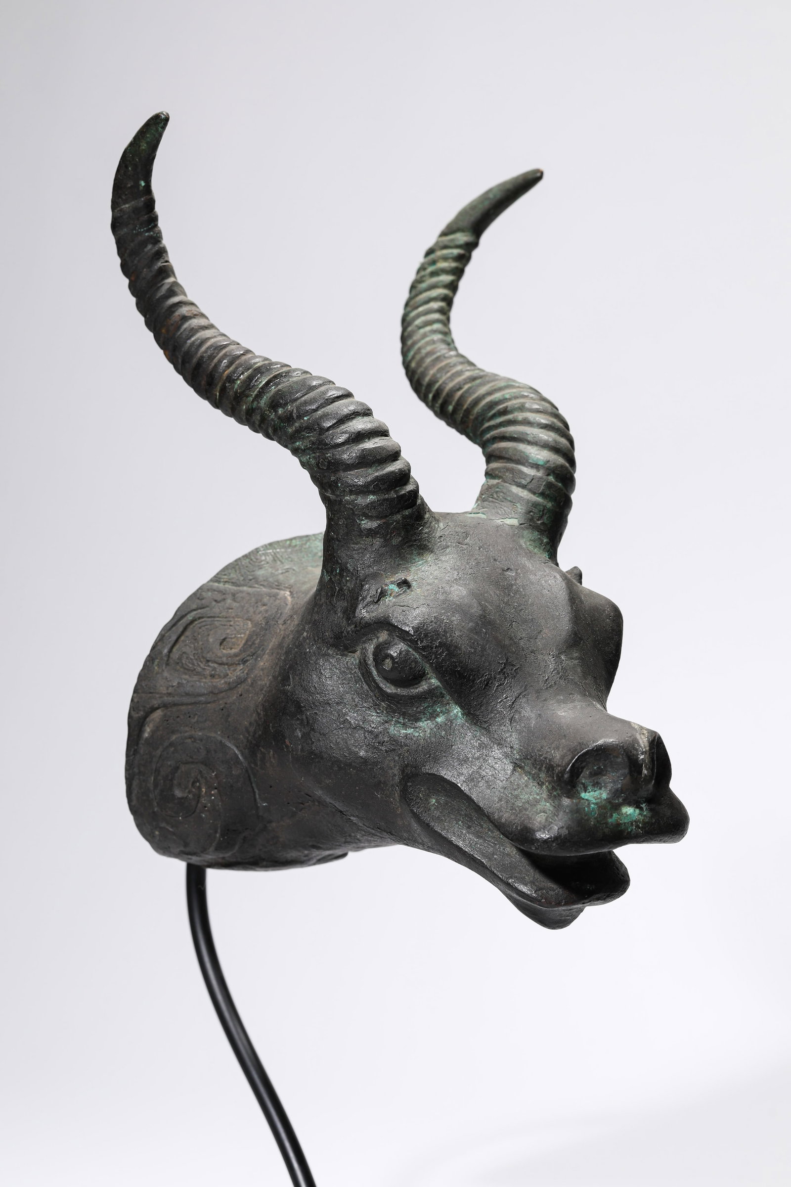 A BRONZE BEAST HEAD - 4