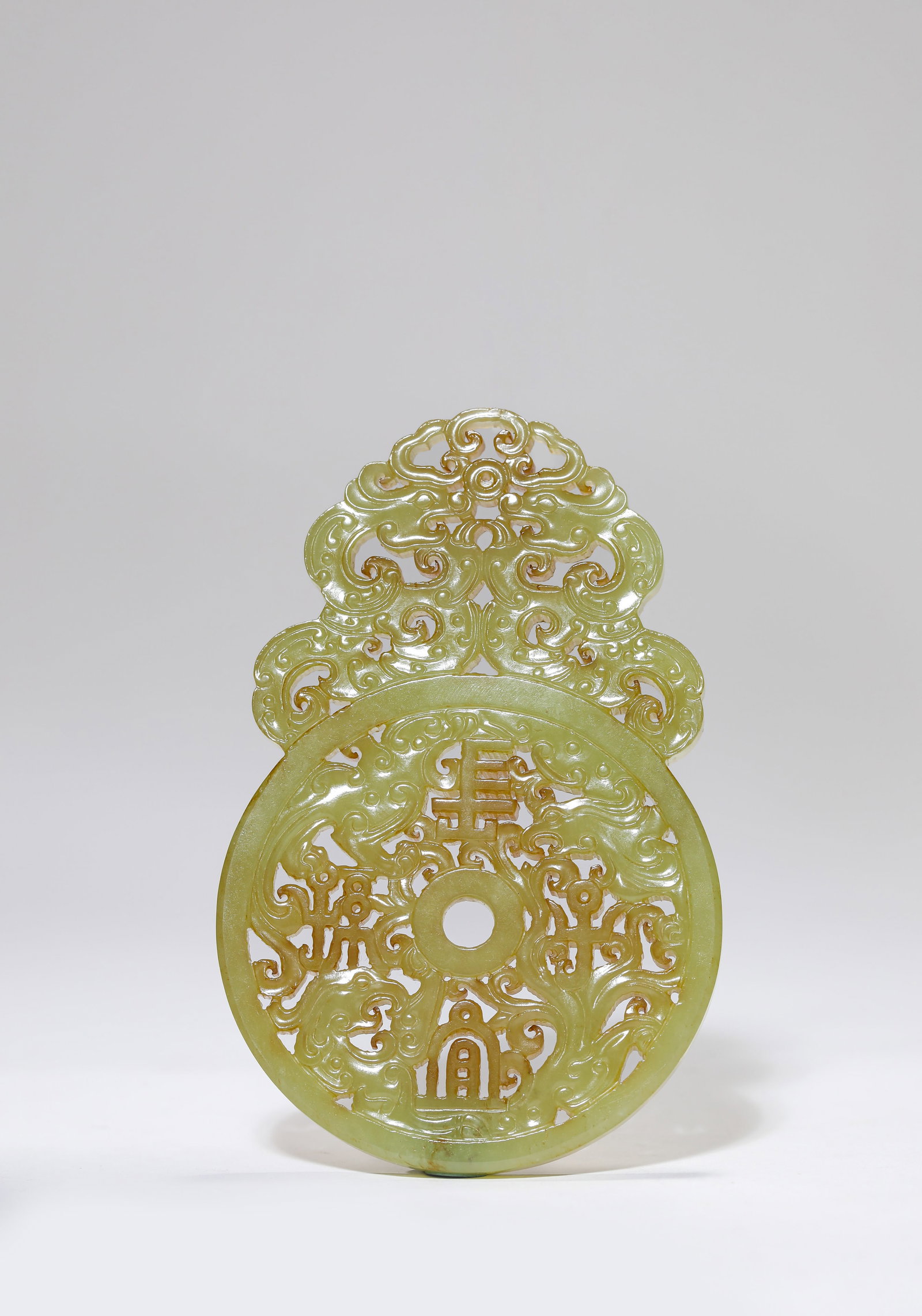 A JADE ‘DRAGON AND PHOENIX’ PLAQUE: A JADE ‘DRAGON AND PHOENIX’ PLAQUE Description: Dimensions: Width: 7 cm x Height: 10.7 cm. All measurements are approximate.