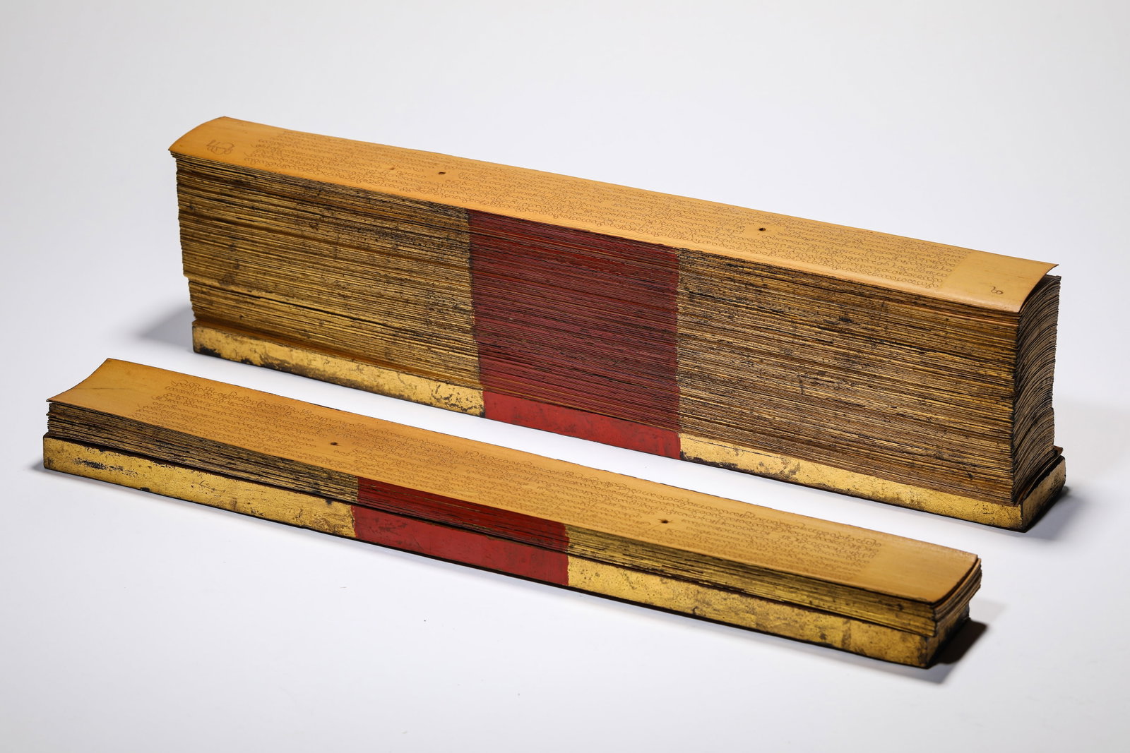 A BUDDHIST SUTRA: A BUDDHIST SUTRA Description: Dimensions: Length: 47 cm x Width: 5.7 cm x Height: 14.5 cm. All measurements are approximate.