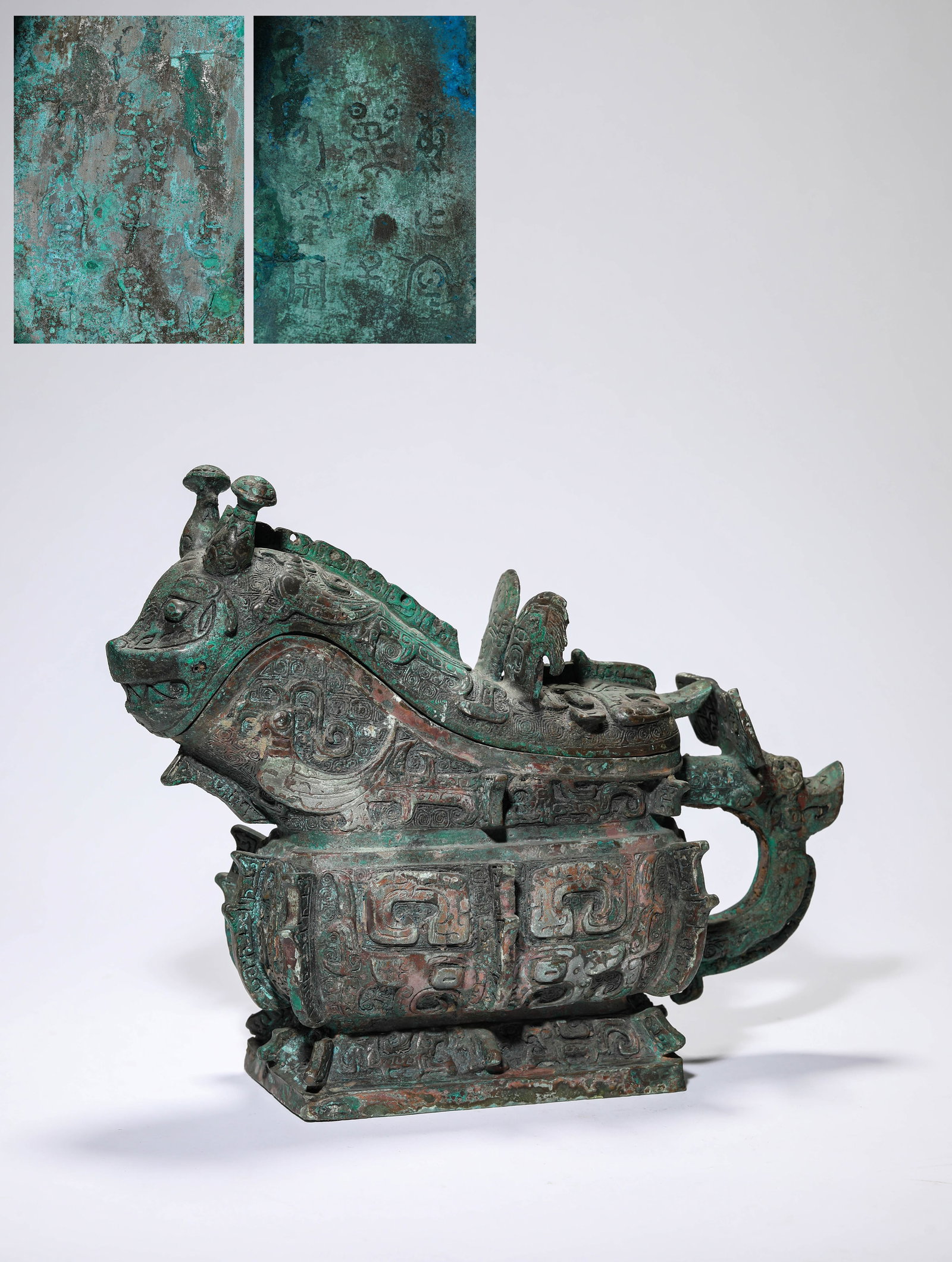 A BRONZE ‘GONG’ RITUAL WINE VESSEL: A BRONZE ‘GONG’ RITUAL WINE VESSEL Description: Dimensions: Weight: 3950 g. Length: 27 cm x Width: 11.8 cm x Height: 23.2 cm. All measurements are approximate.