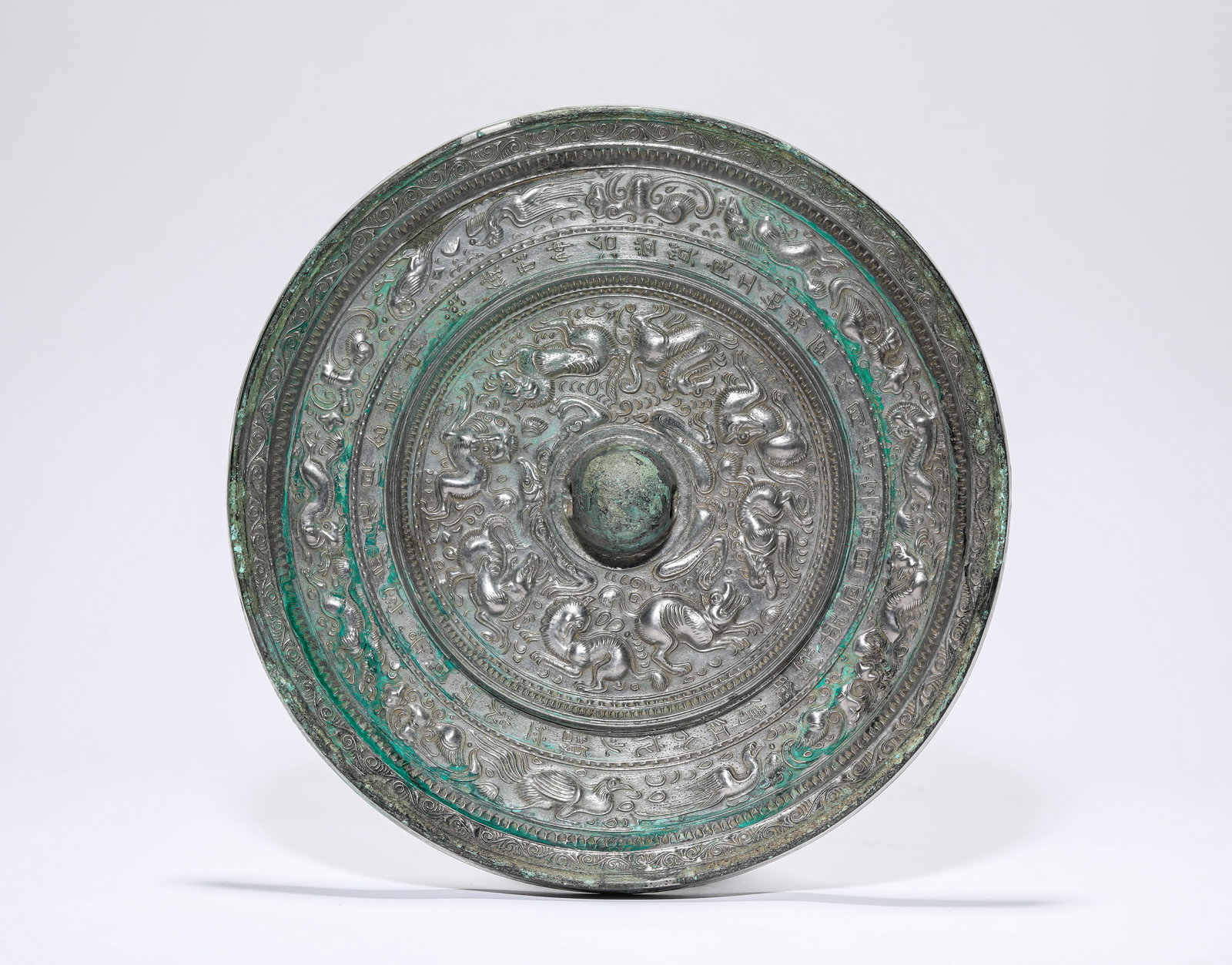 A BRONZE MIRROR - 2