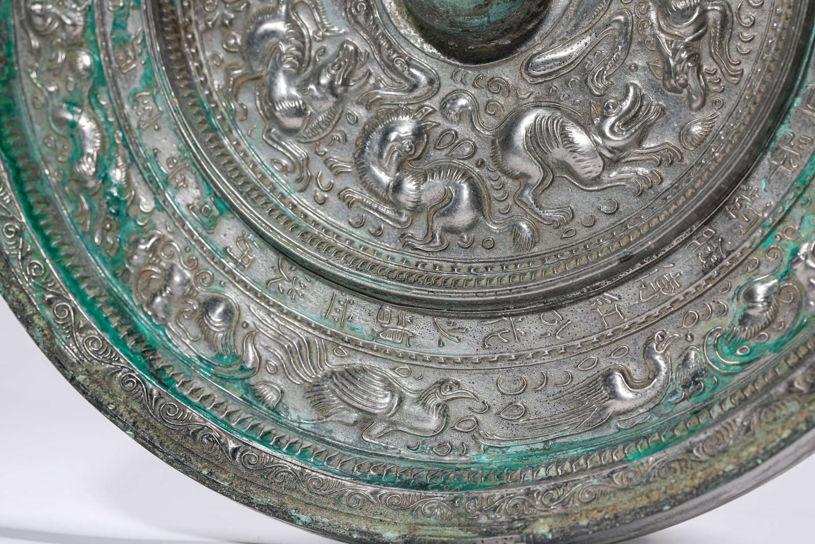 A BRONZE MIRROR - 3