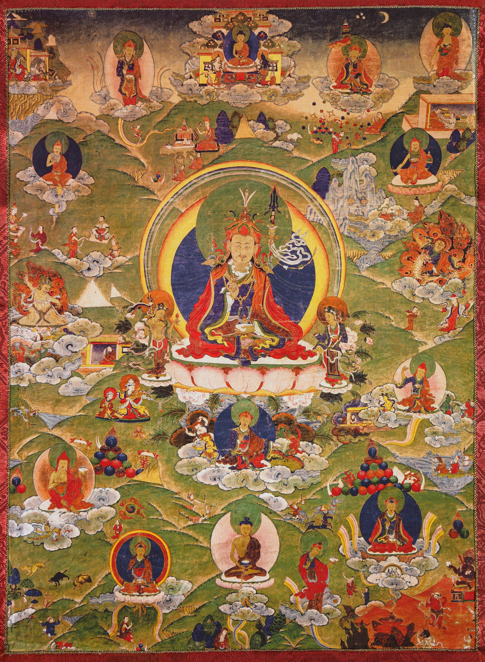 A THANGKA OF PADMASAMBHAVA: A THANGKA OF PADMASAMBHAVA Description: Dimensions: Width: 30.5 cm x Height: 42 cm. All measurements are approximate.