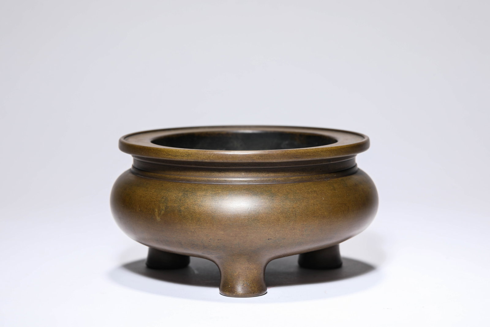 A BRONZE ‘LI-FORM’ CENSER: A BRONZE ‘LI-FORM’ CENSER Description: Dimensions: Weight: 2050 g. Width: 15.3 cm x Height: 7.9 cm. All measurements are approximate.