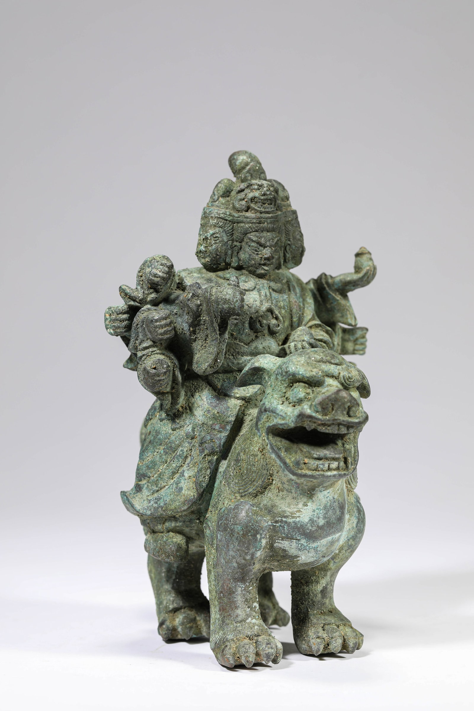 A BRONZE FIGURE OF BUDDHA: A BRONZE FIGURE OF BUDDHA Description: Dimensions: Weight: 2759 g. Length: 15.9 cm x Width: 10.5 cm x Height: 18 cm. All measurements are approximate.
