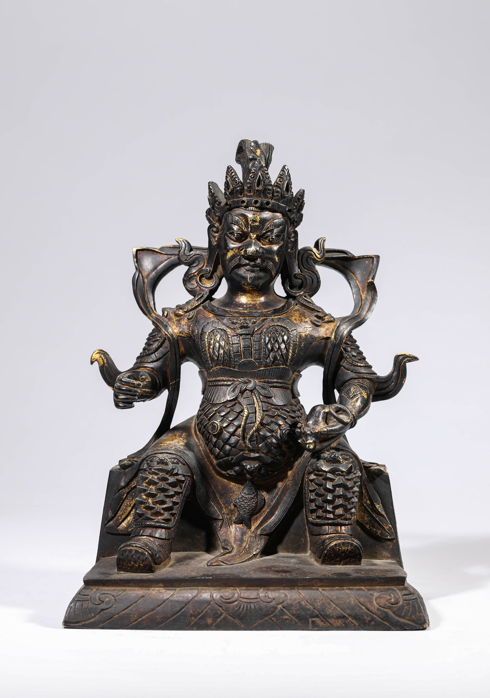 A GILT-BRONZE FIGURE OF VAISHRAVANA: A GILT-BRONZE FIGURE OF VAISHRAVANA Description: Dimensions: Weight: 4450 g. Length: 17.5 cm x Width: 13.6 cm x Height: 23.5 cm. All measurements are approximate.
