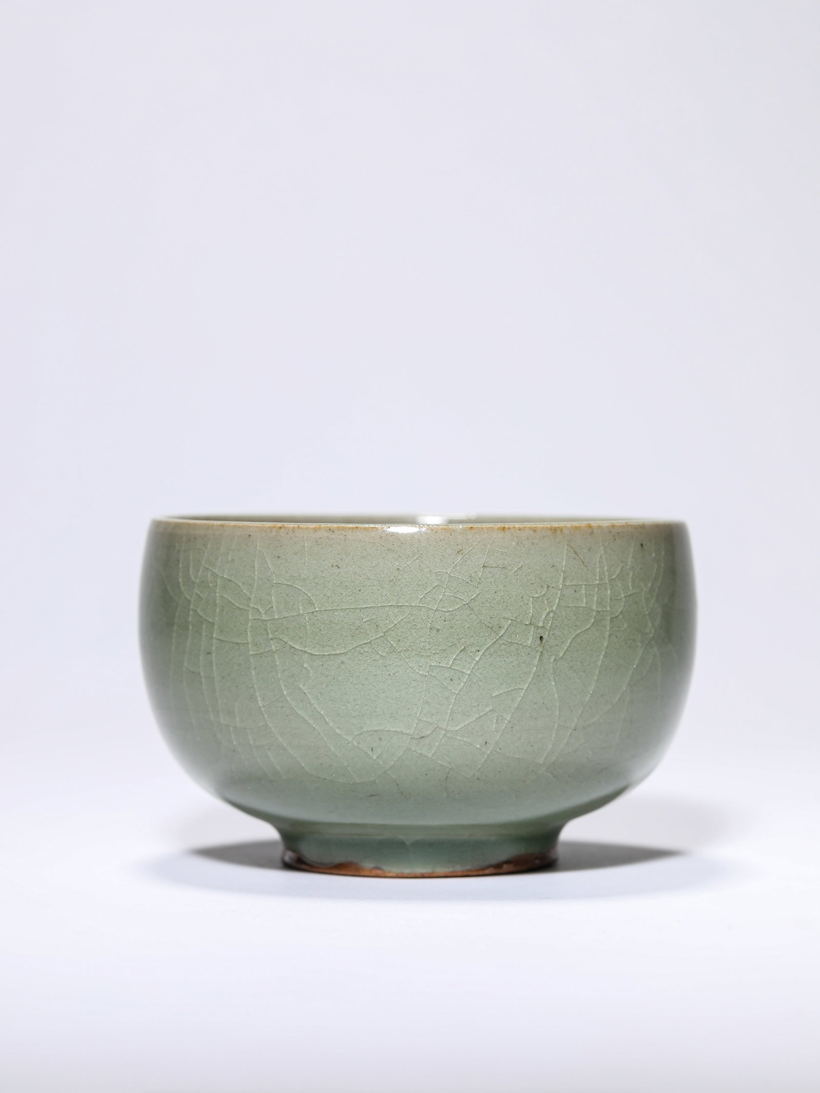 A CELADON-GLAZED BOWL - 3