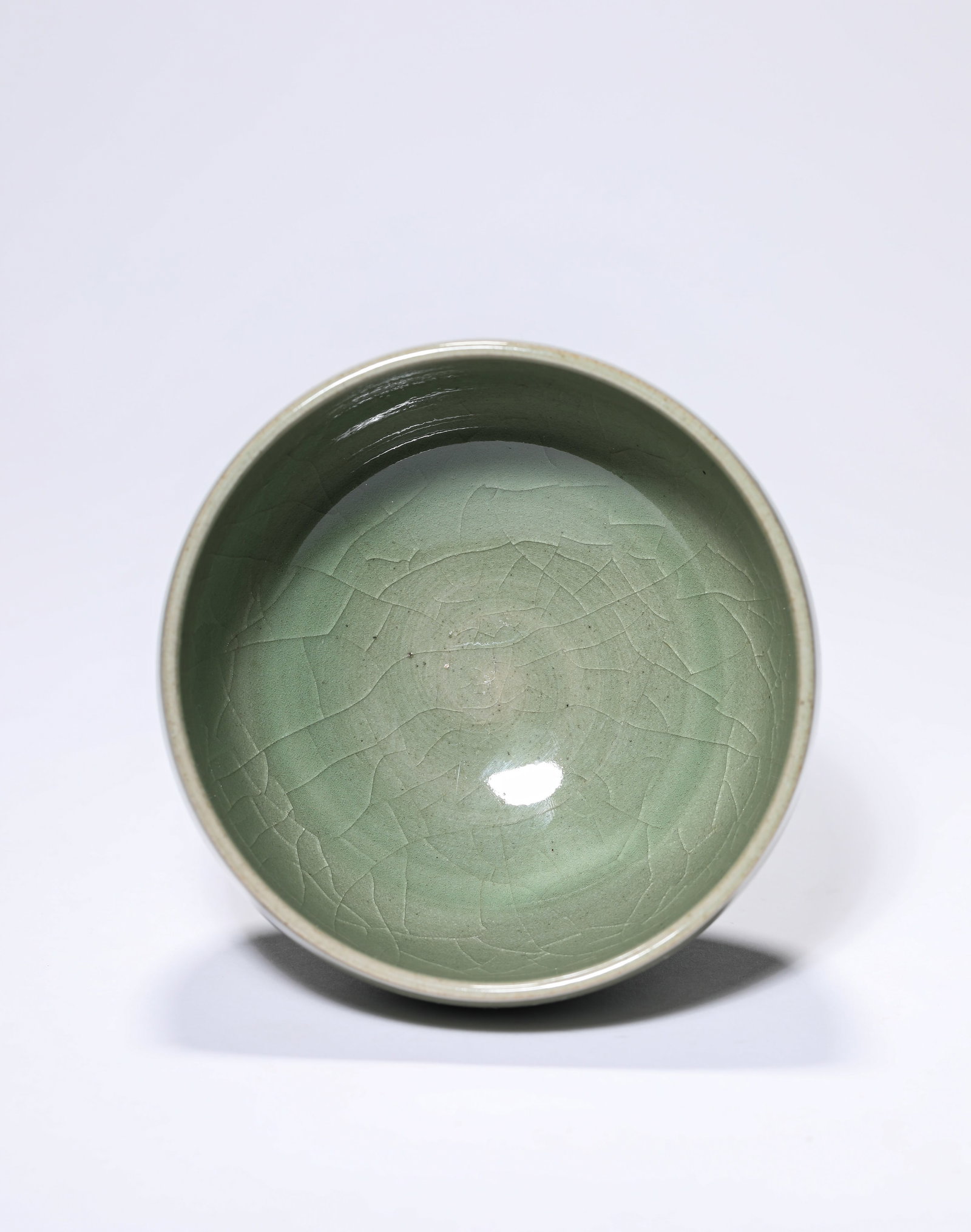 A CELADON-GLAZED BOWL - 4