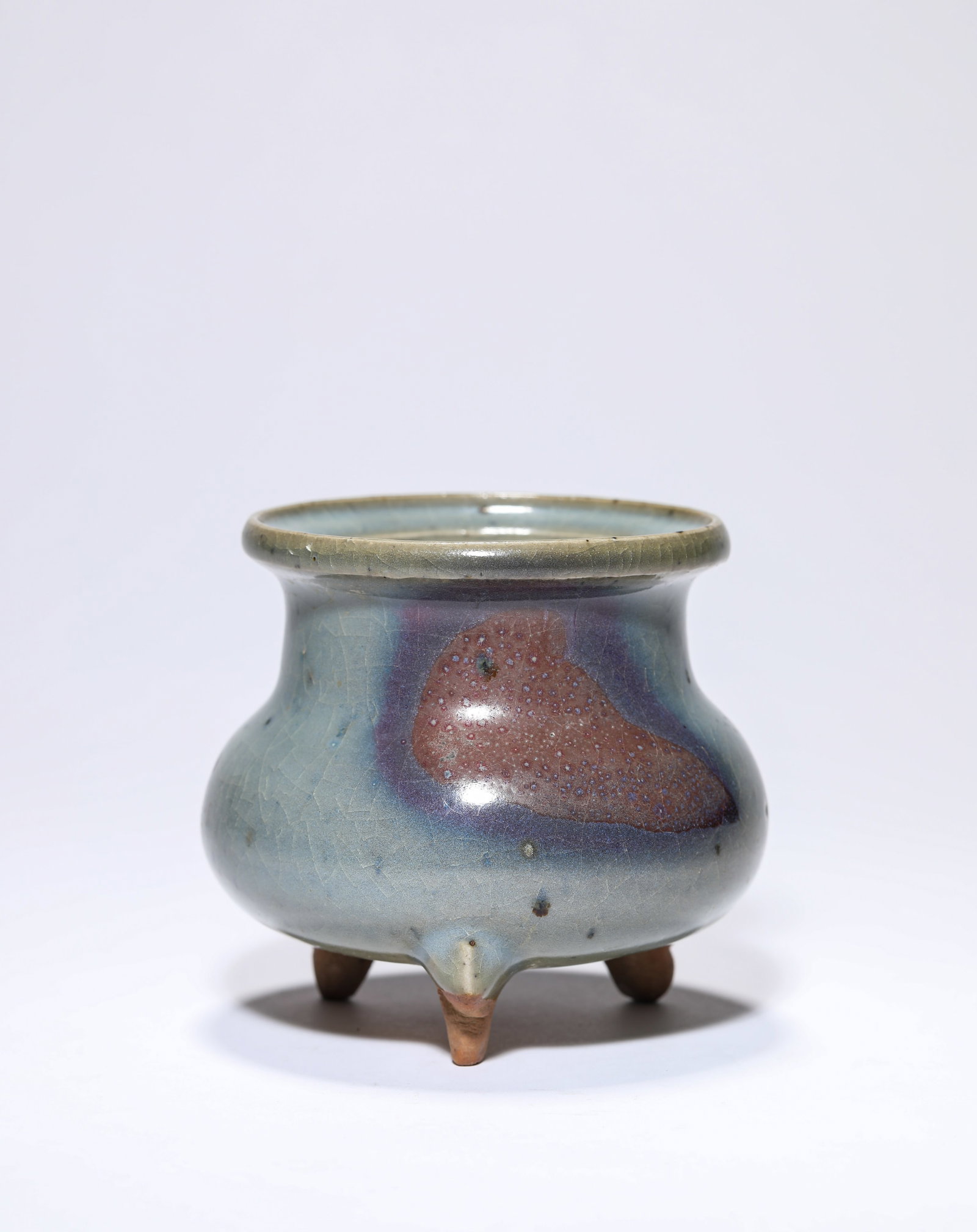 A JUN-TYPE TRIPOD CENSER: A JUN-TYPE TRIPOD CENSER Description: Dimensions: Width: 9.8 cm x Height: 8.8 cm. All measurements are approximate.