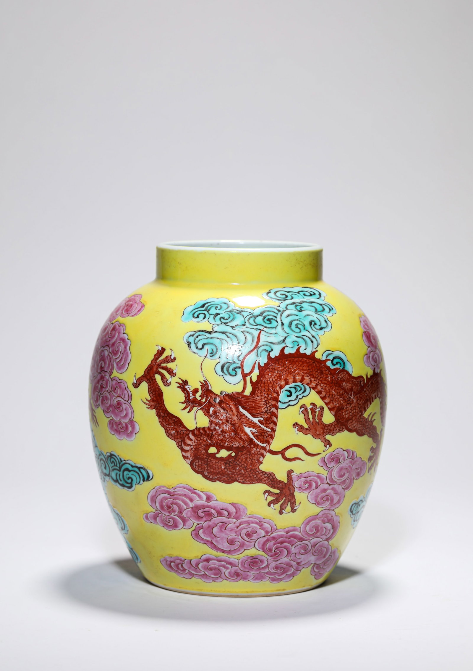 A YELLOW-GROUND FAMILLE-ROSE ‘DRAGON’ JAR: A YELLOW-GROUND FAMILLE-ROSE ‘DRAGON’ JAR Description: Dimensions: Width: 17.3 cm x Height: 20.5 cm. All measurements are approximate.